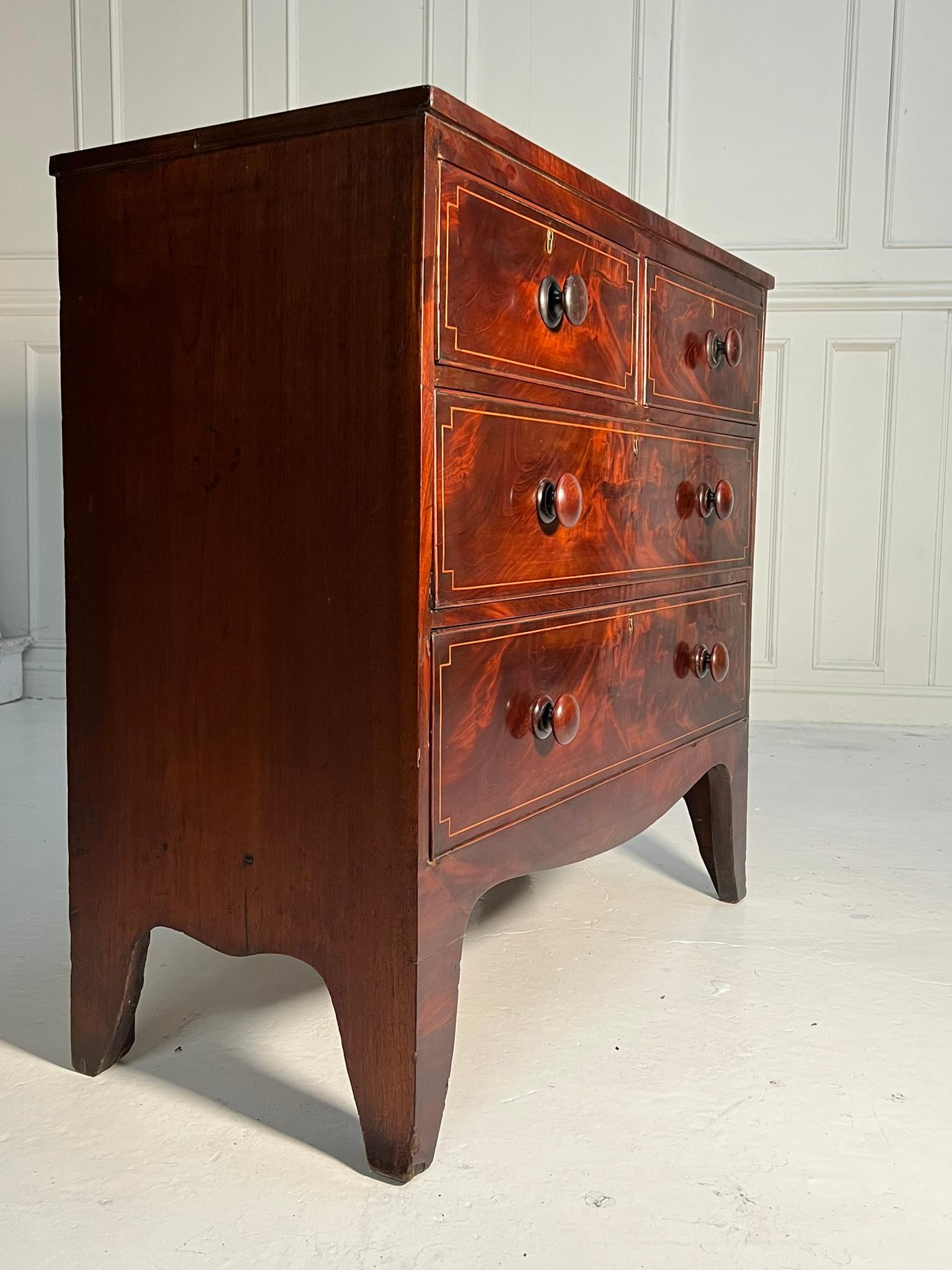 Beautifully figured Mahogany chest of drawers with boxwood stringing to the drawer fronts and top.

Standing on splayed legs adjoined by a sweeping stretcher.

English C1810.

Height 97cm
Width 97cm
Depth 47cm

(measurements are approximate and are