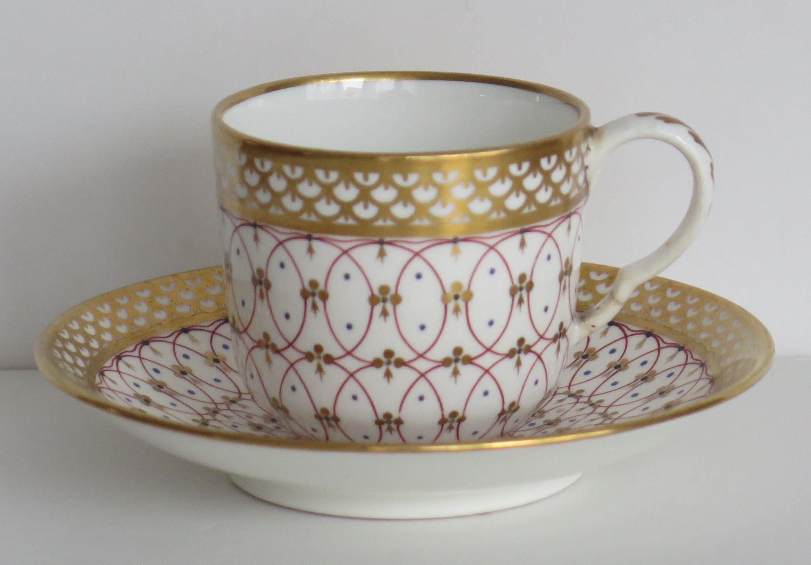 This is a beautiful porcelain duo of a cup and saucer by the Derby factory, made during the late Georgian, Regency period of the first half of the 19th century, circa 1830

The hand decoration is exquisite, both pieces having intertwining red