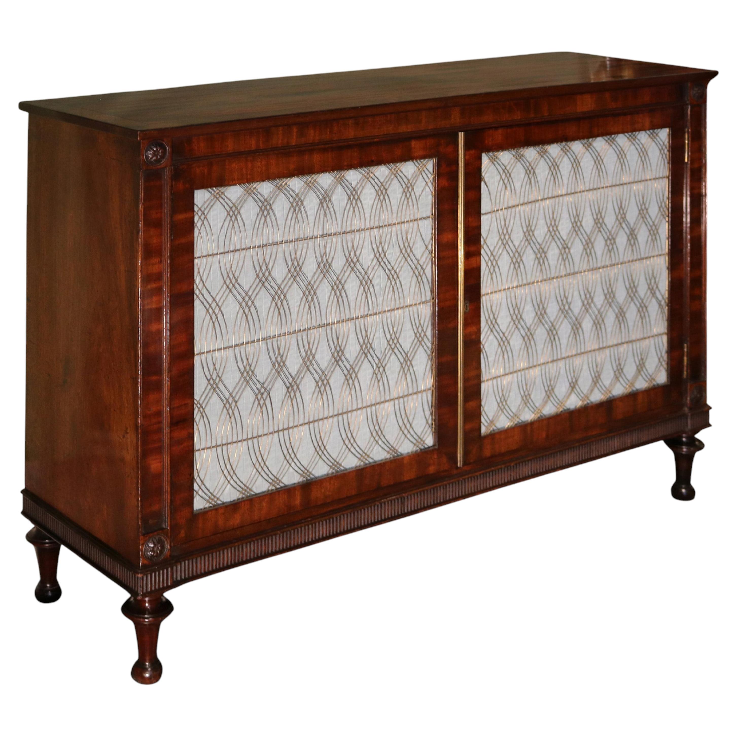 Regency period mahogany and brass grille 2 door Cabinet