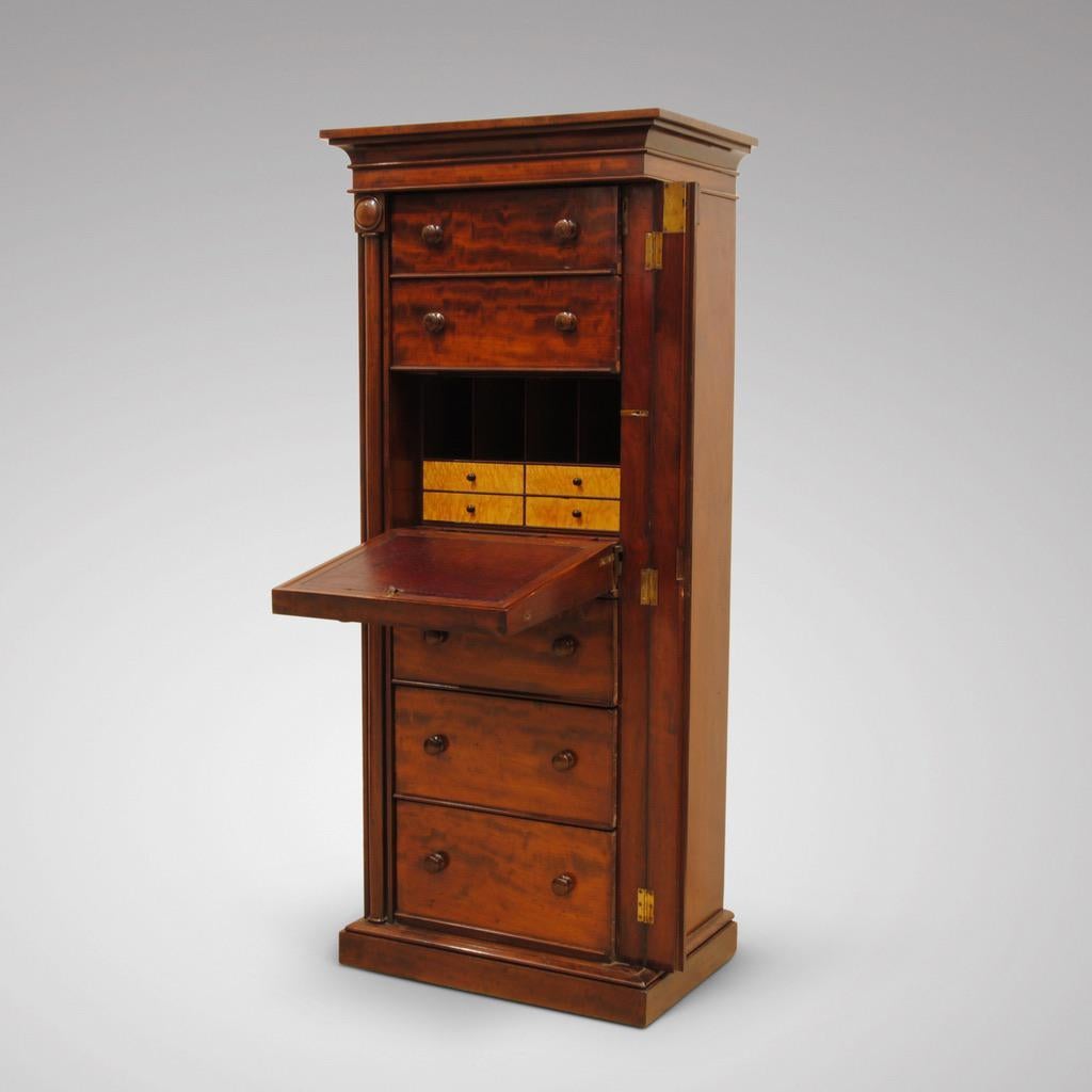 A fine Regency period mahogany wellington chest with an unusual secretaire drawer, superb color and patina to this high quality piece of furniture,
circa 1825.