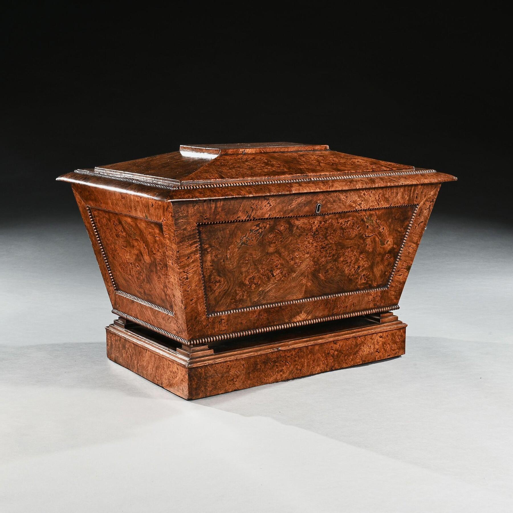 An Outstanding George IV Period Wine Cooler or Cellarette in Pollard Oak of Exceptional Colour and Patina

English - George IV, circa 1825.

This fine piece is of late regency/George IV period and is veneered throughout in pollard oak of the most