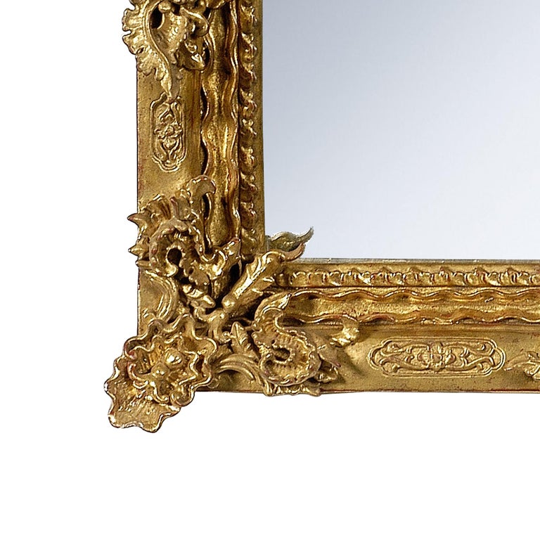 Neoclassical Regency rectangular handcrafted mirror. Square hand carved wooden structure with gold foil finished, Spain, 1970.