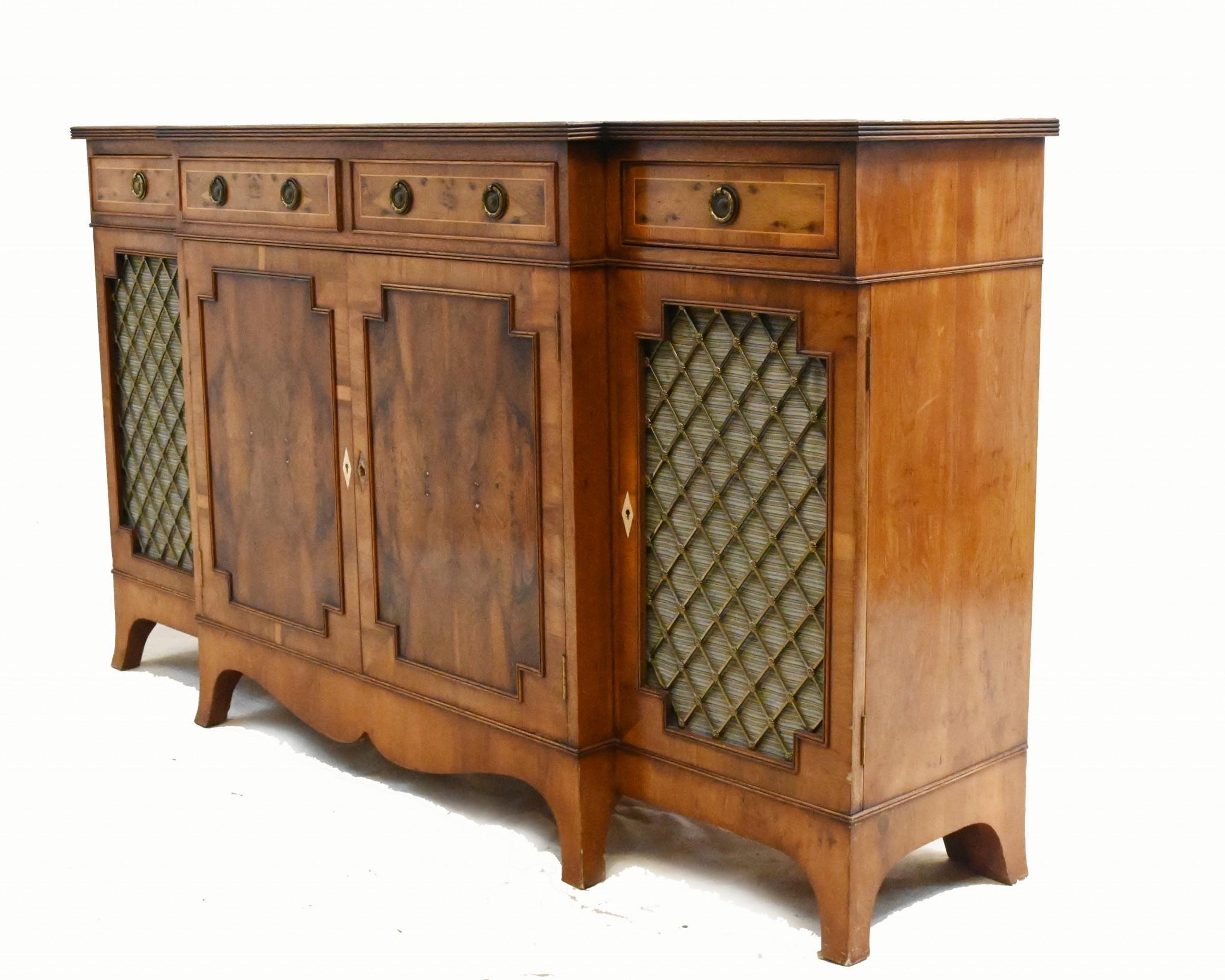 You are viewing a gorgeous Regency Revival chiffonier or sideboard
Elegant piece we date to circa 1930
Breakfront form to the front
Viewings available by appointment
Offered in great shape ready for home use right away
We ship to every corner of the