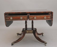 Regency rosewood and brass inlaid sofa table