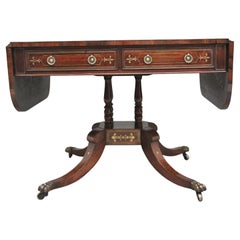 Regency rosewood and brass inlaid sofa table