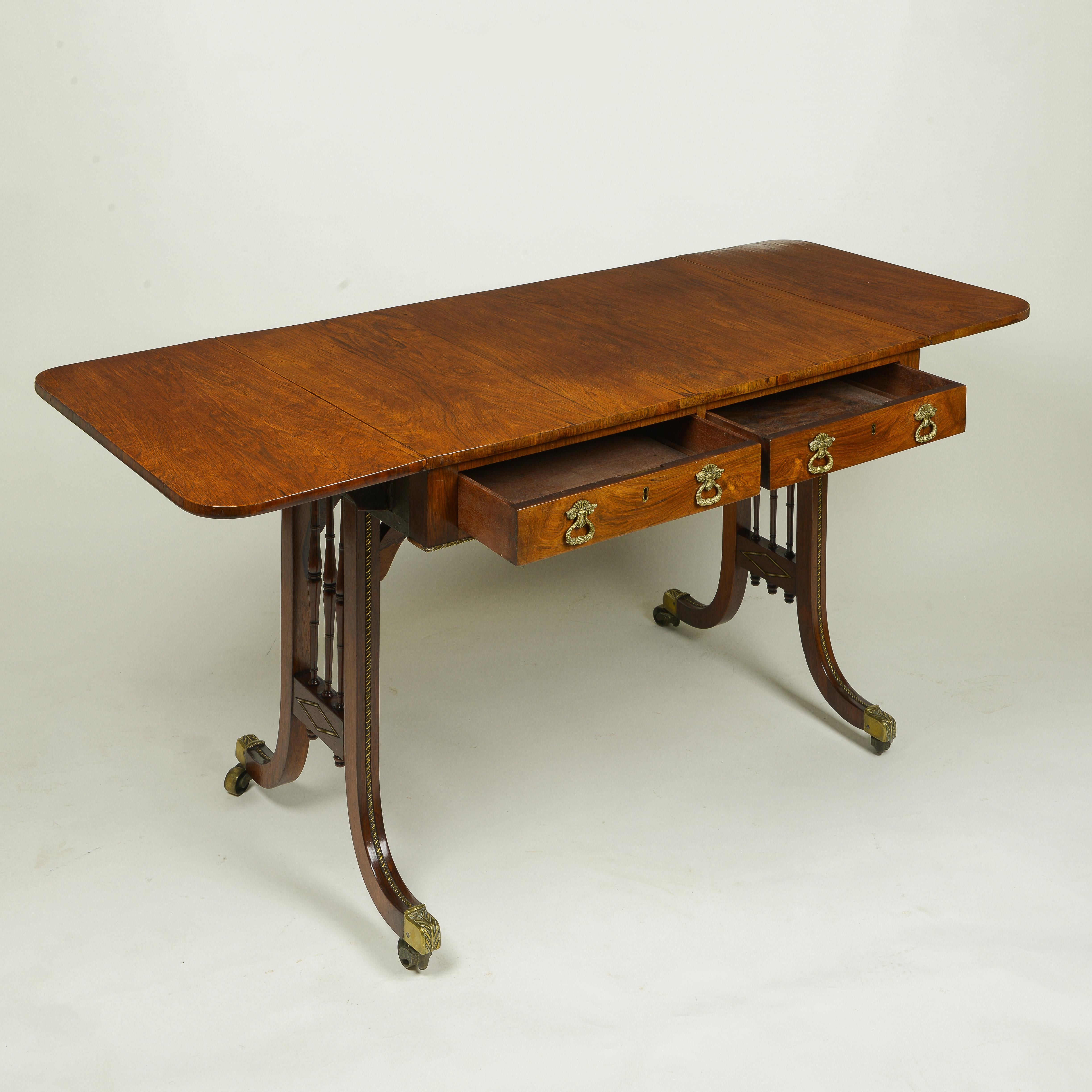 Early 19th Century Regency Rosewood and Gilt-Metal Mounted Sofa Table For Sale