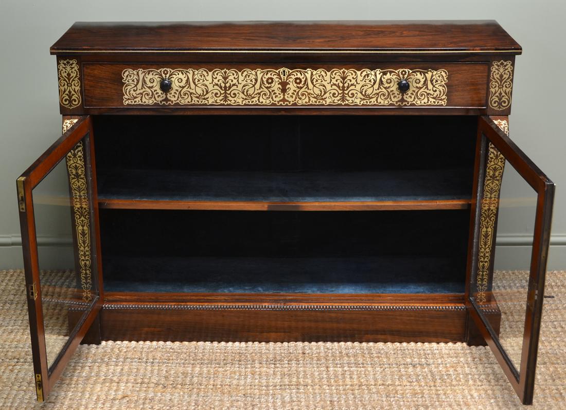 Spectacular Regency rosewood brass inlaid antique secretaire cabinet

Constructed from the finest quality figured rosewood, this spectacular secretaire cabinet has the most sensational brass inlays that could only be the work of a true craftsman