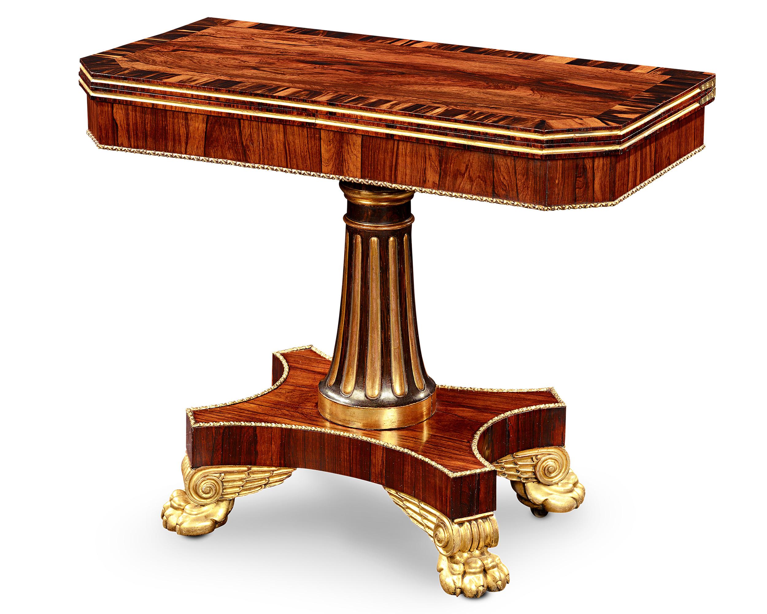These exceptional late Regency card tables were designed with both elegance and functionality in mind. Crafted of rosewood after a model by Henry Holland, the calamander-banded and gilt tables serve as a well-appointed side table with a 