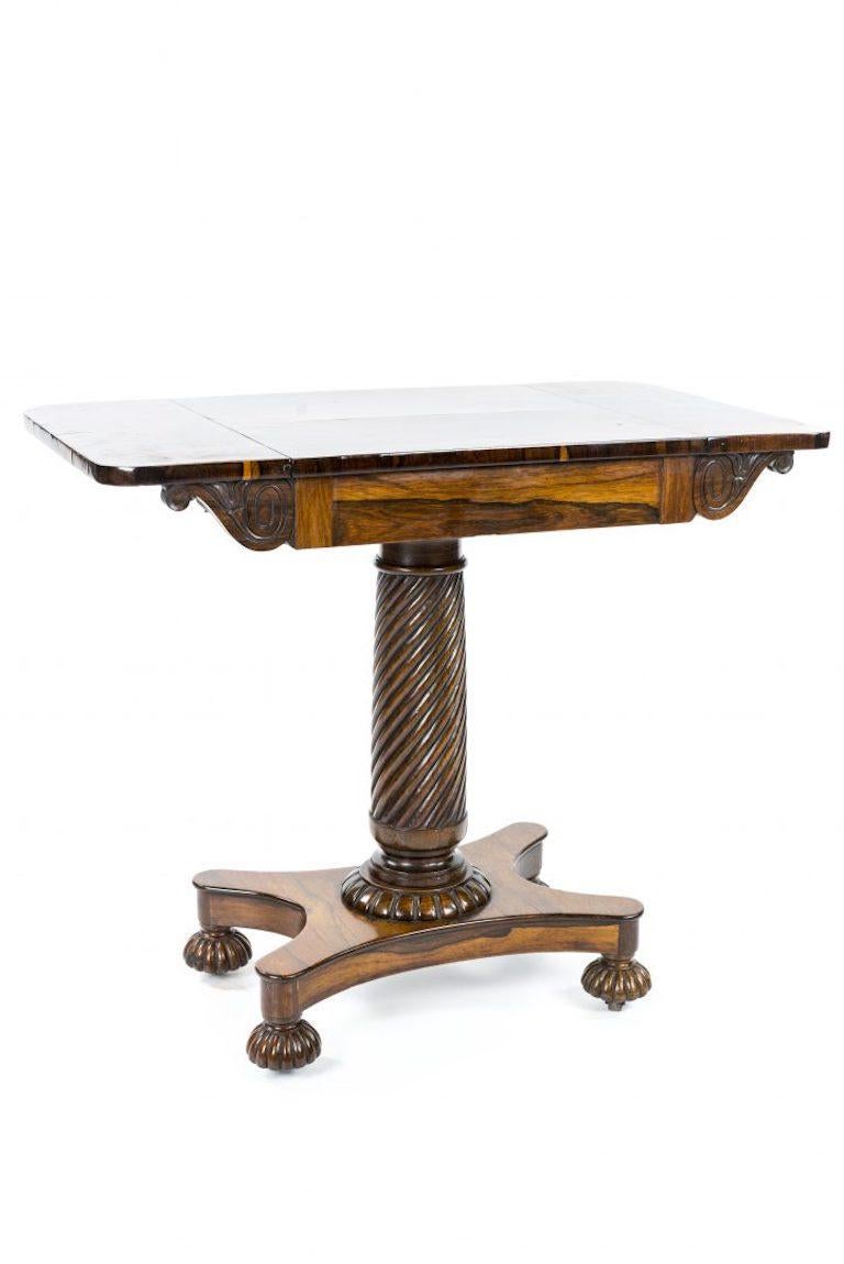 Regency rosewood chess and occasional table, attributed to Gillows of Lancaster, supported on a wrythen column, to a platform base with four carved feet.

Gillows of Lancaster and London, also known as Gillow & Co., was an English furniture making