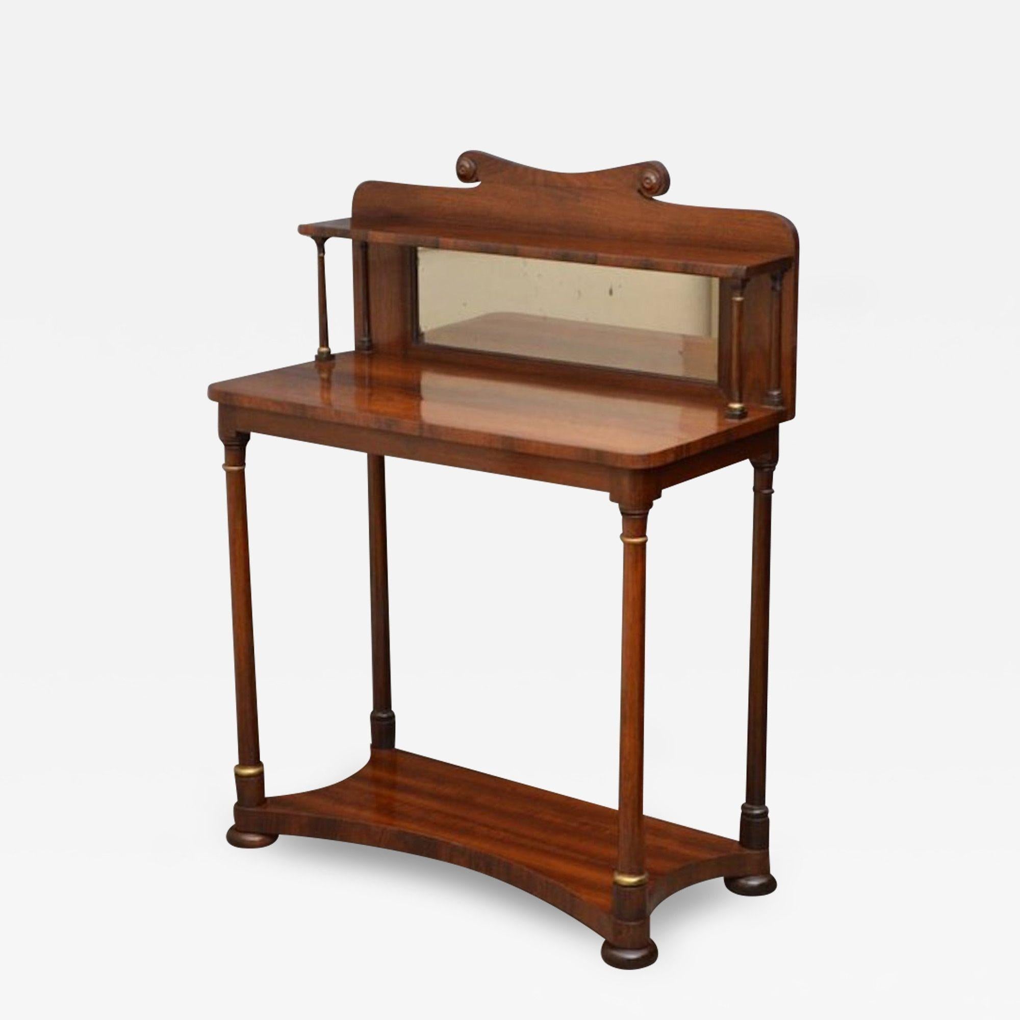 Sn3294 Exceptional Regency console table- hall table in rosewood, having shaped shelf with shaped upstand, supported on elegant columns, figured rosewood top and slender supports with gilded capitals terminating in shaped base and bun feet. All in