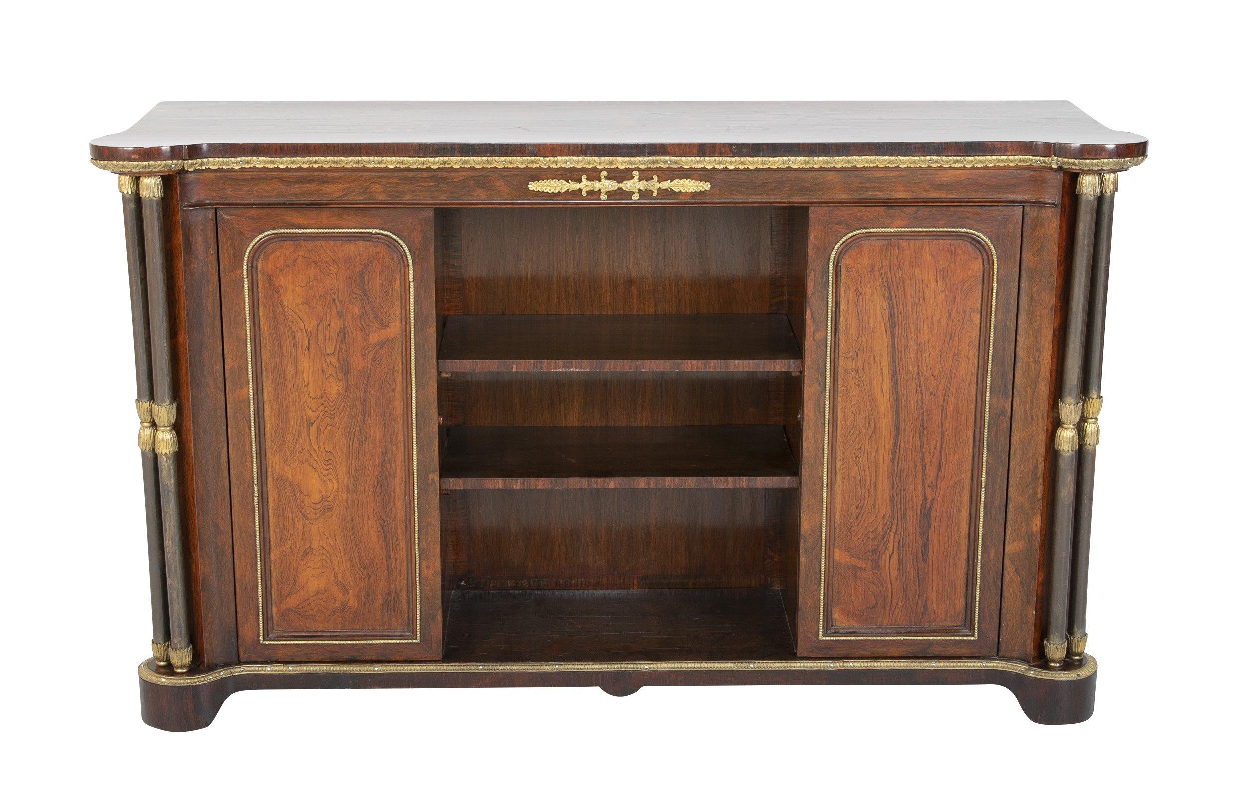 A fine English Regency rosewood bronze-mounted credenza with rare steel double column supports.