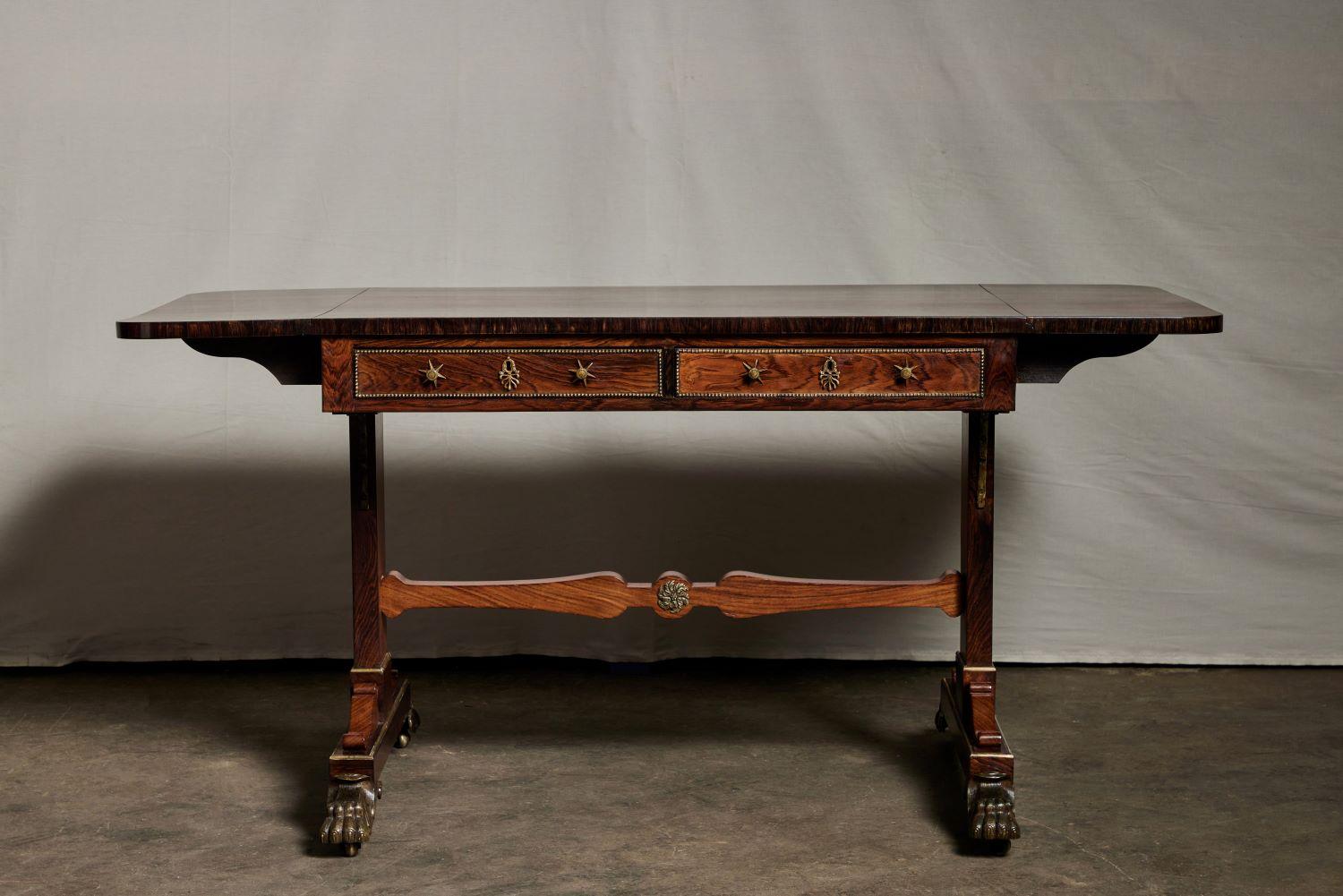 English Regency rosewood writing desk with 2 drawers. The desk's width is 38