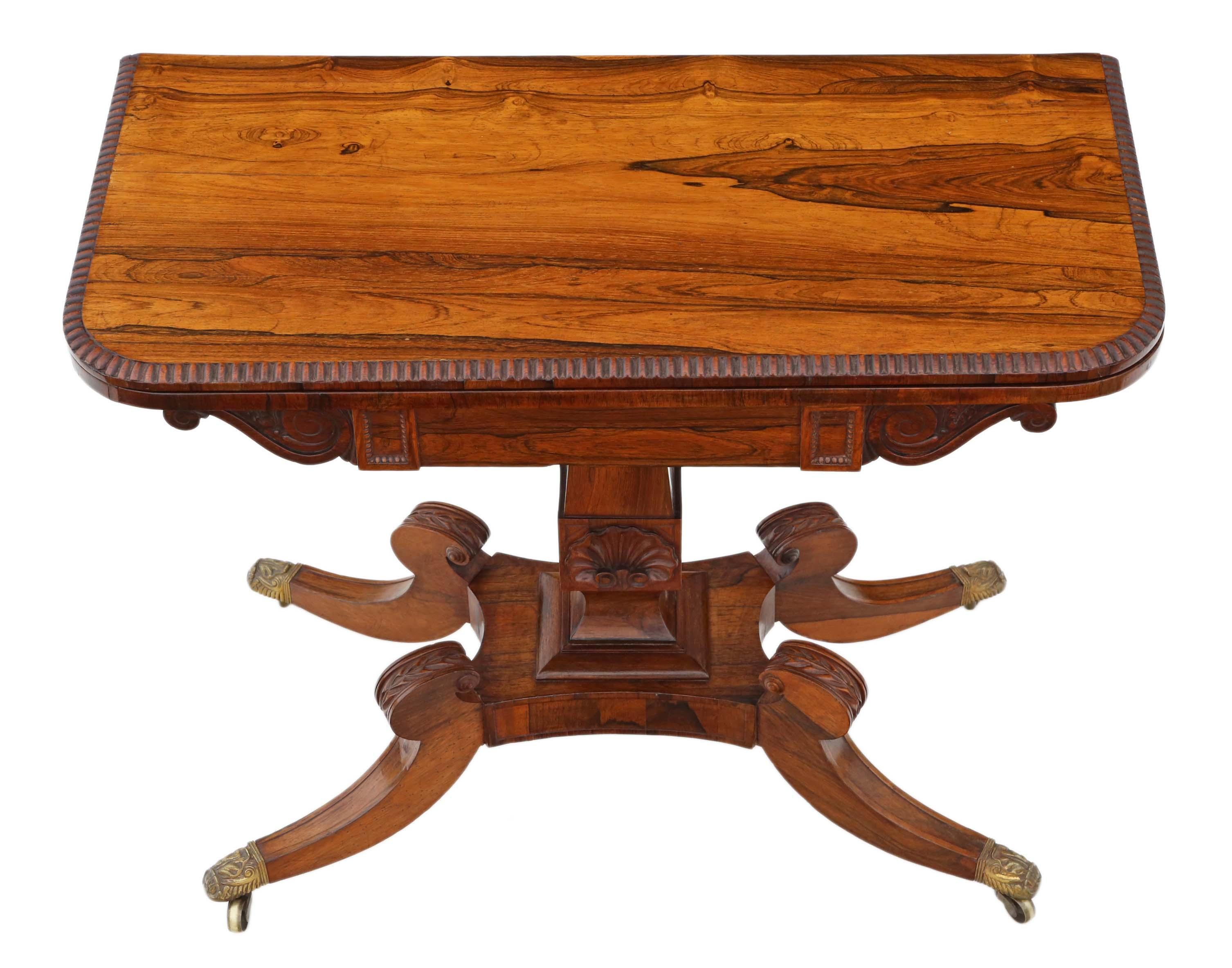 Antique fine quality Regency (circa 1825) rosewood folding tea or console table.
This is a lovely table of exceptional quality.
Solid, with no loose joints.
Brass castors.
The table has a wonderful patina and elegant pedestal base.
Lovely age
