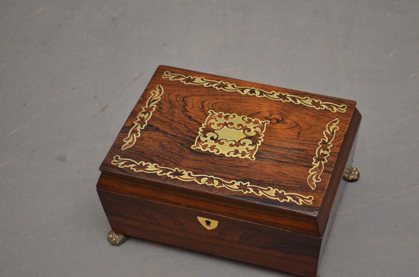 Sn4489 Regency rosewood and brass inlaid sarcophagus box with lift up tray and brass paw feet, circa 1820
Measures: H 4