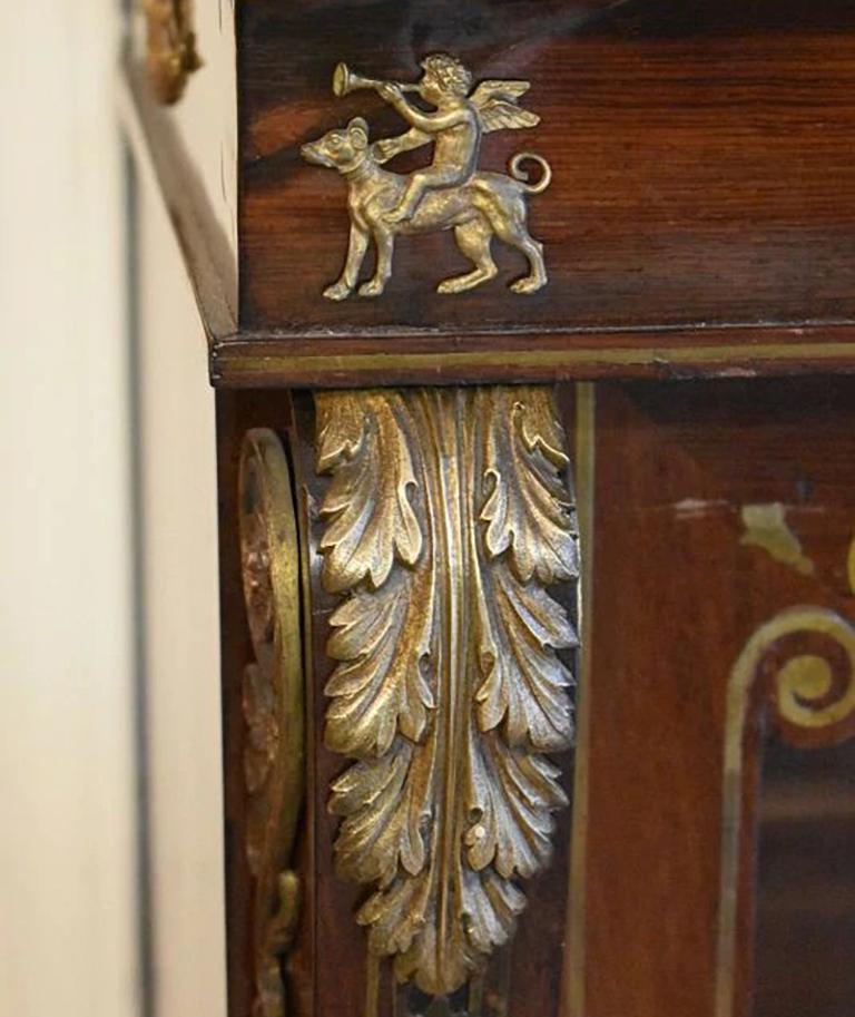 19th Century Regency Rosewood Marble Top Cabinet Table.

Regency Rosewood Marble Top Cabinet, circa 1815.

Having shelved interior and likely with pleated fabric behind the doors, mounts and ebony.

Measures: 41