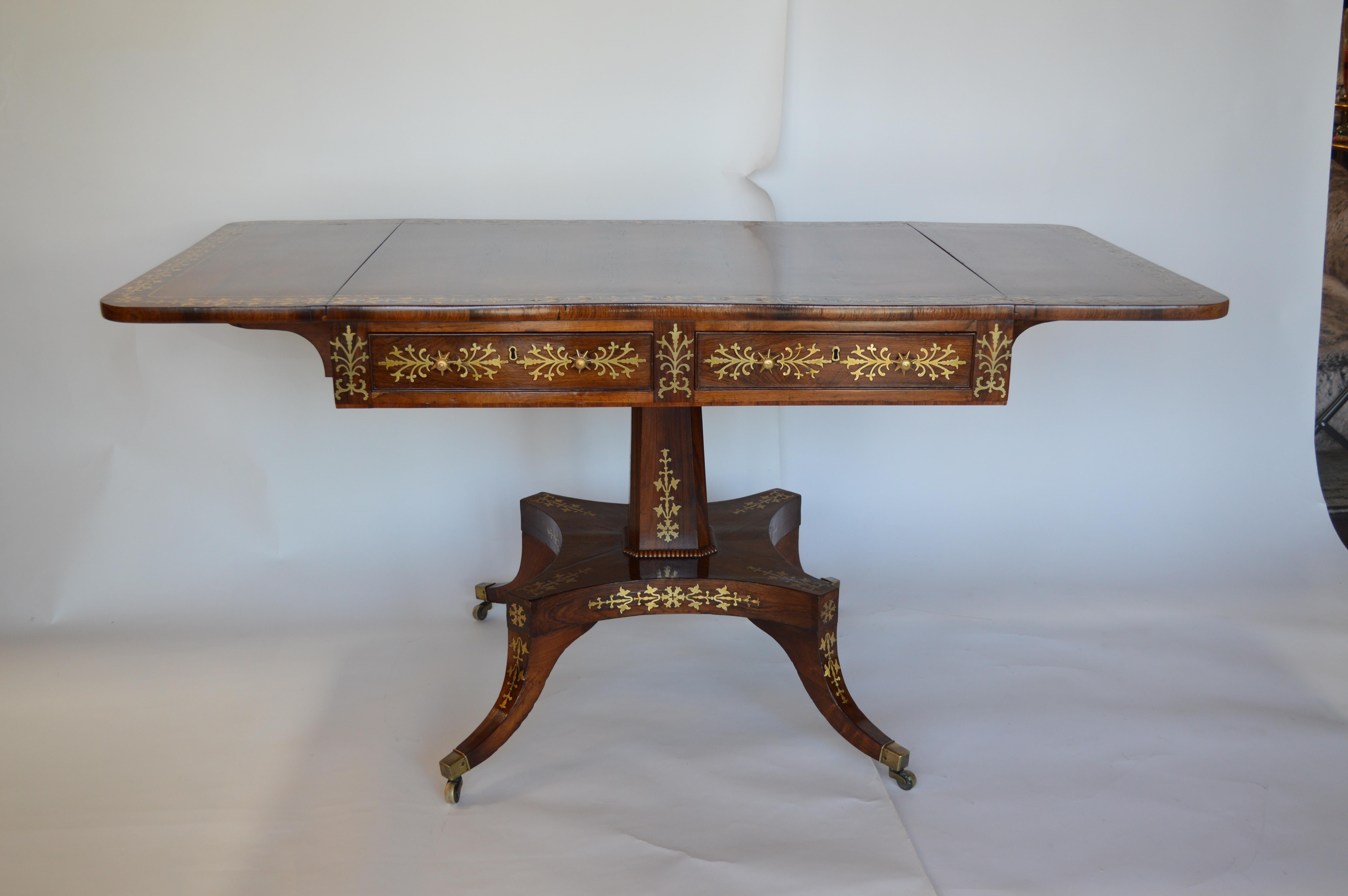 French Regency Rosewood Pedestal Table with Brass Inlaid For Sale