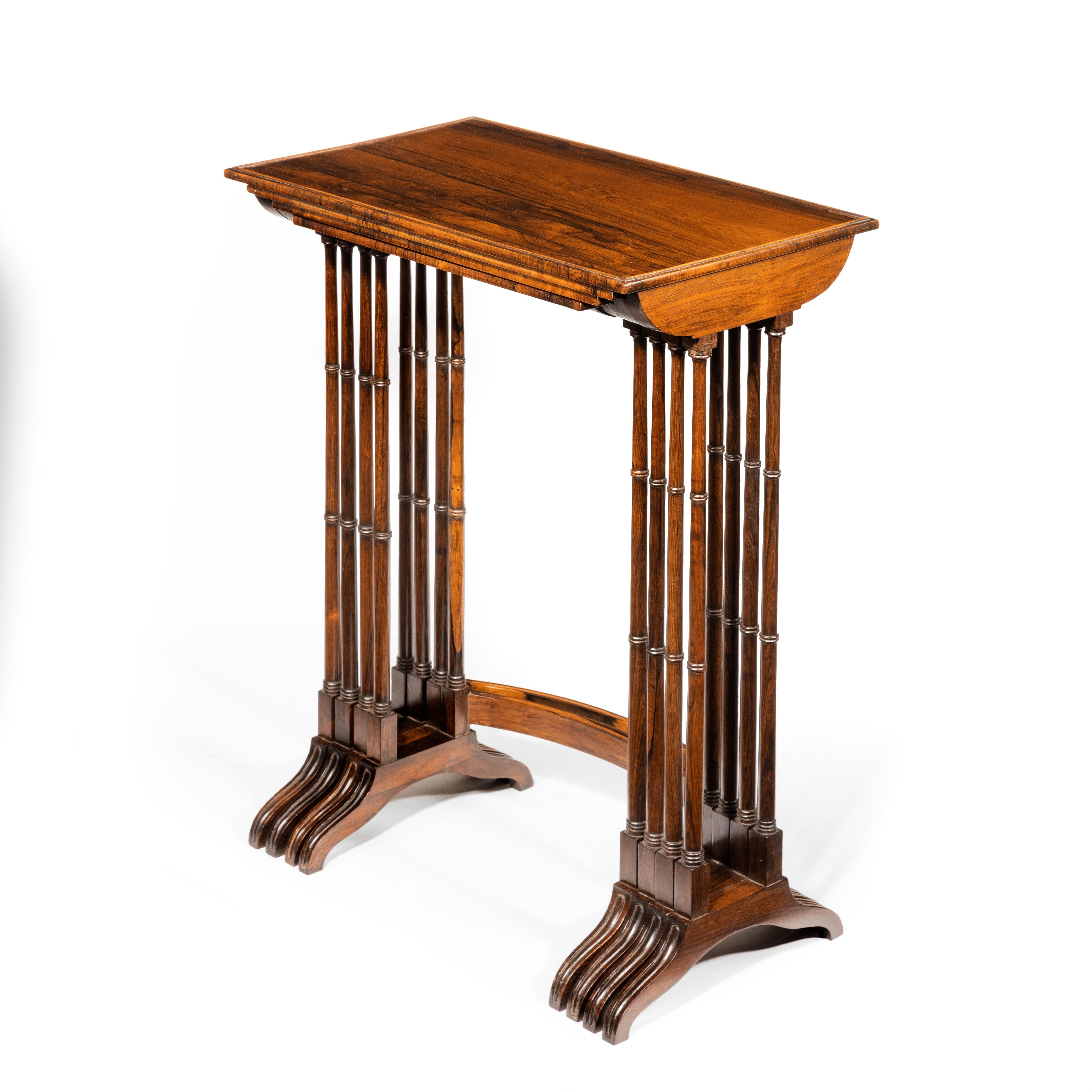 An attractive nest of Regency rosewood quartetto tables, each of rectangular form with cock-beading round the edges, raised upon finely turned legs upon crinoline stretchers, English, circa 1825.
 