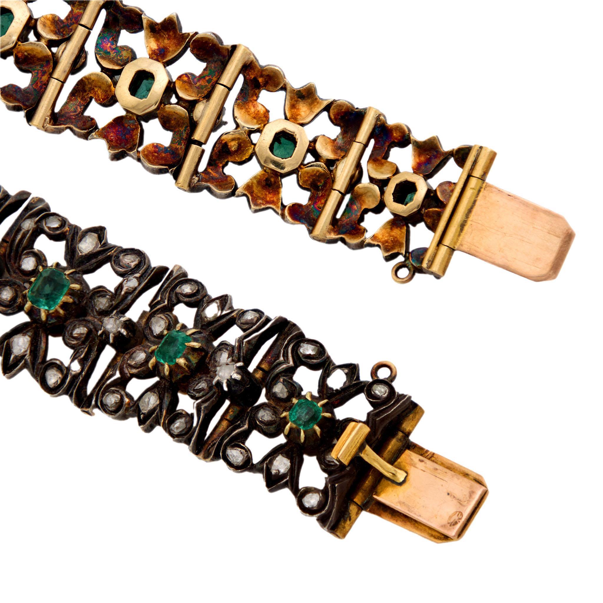A stunning emerald and diamond bracelet from the Regency (ca1810s) era! Crafted in 14k gold and sterling silver, this bracelet is comprised of 11 flexible square-shaped links. Although the links graduate in size, they all feature an identical