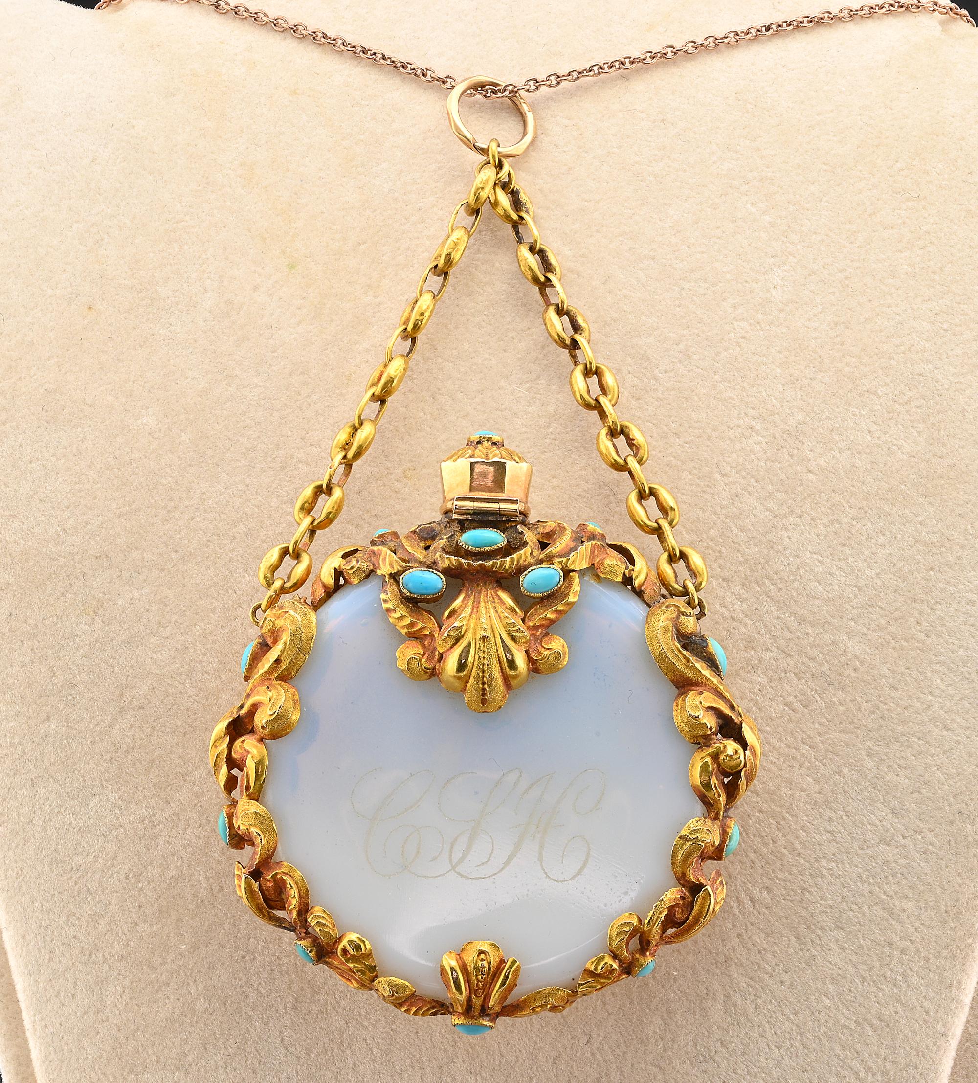 Rare beautiful Regency period 1820 circa antique scent bottle pendant
Fascinating Opaline Azure color with engraved Monogram letters, rarely decorated in 15 Ct solid gold with fantastic scrolls and carvings, embellished with natural