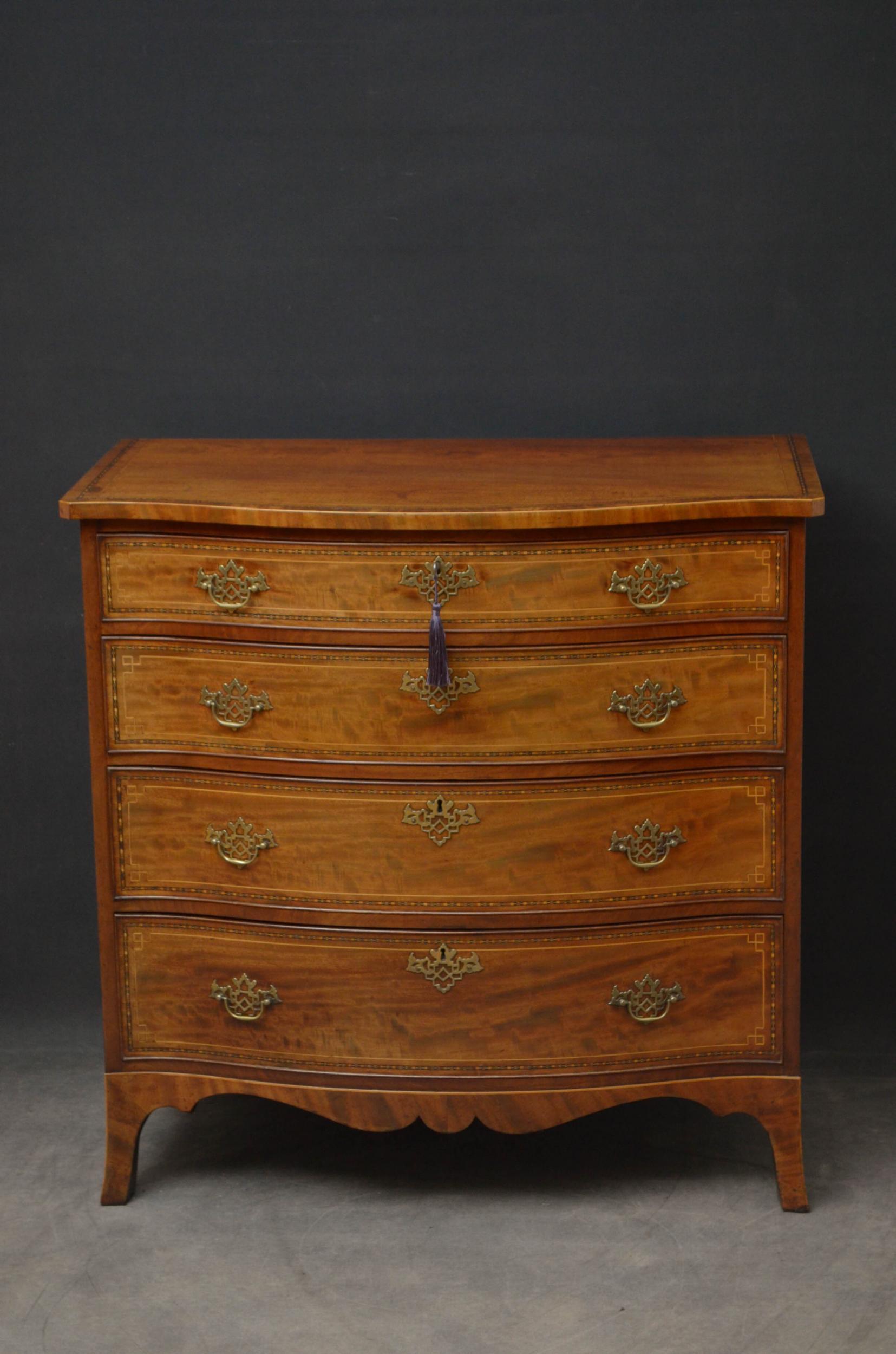 Sn4910 fine quality Regency mahogany chest of drawers of serpentine outline, having figured mahogany top with finely inlaid edge above four mahogany lined, graduated and cockbeaded and inlaid drawers all fitted with brass handles, escutcheons and