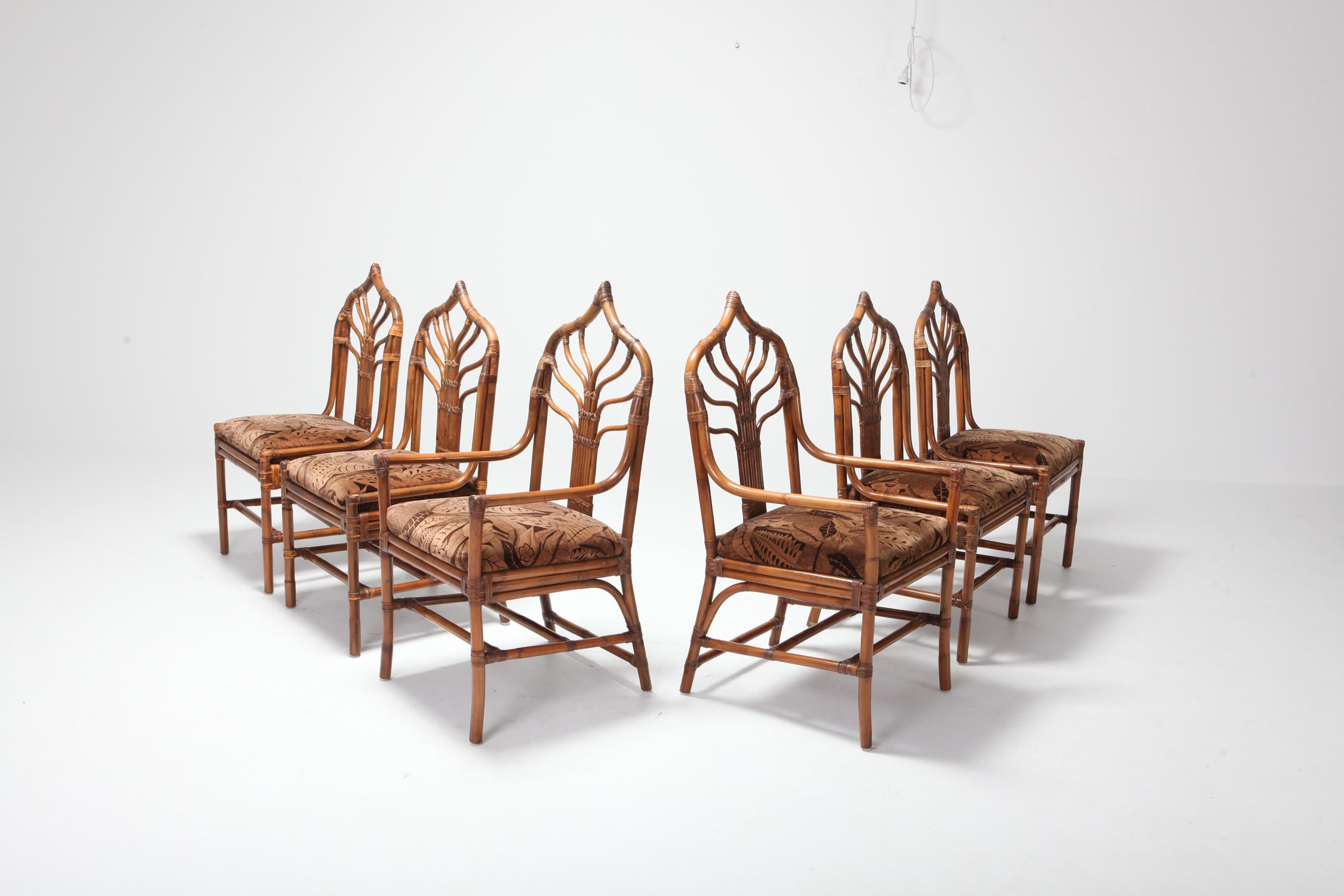 Sculptural Italian bamboo dining chairs with floral original upholstery. 
A set of 6 with 4 chairs and 2 armchairs. 


Italy, 1960s.


 
