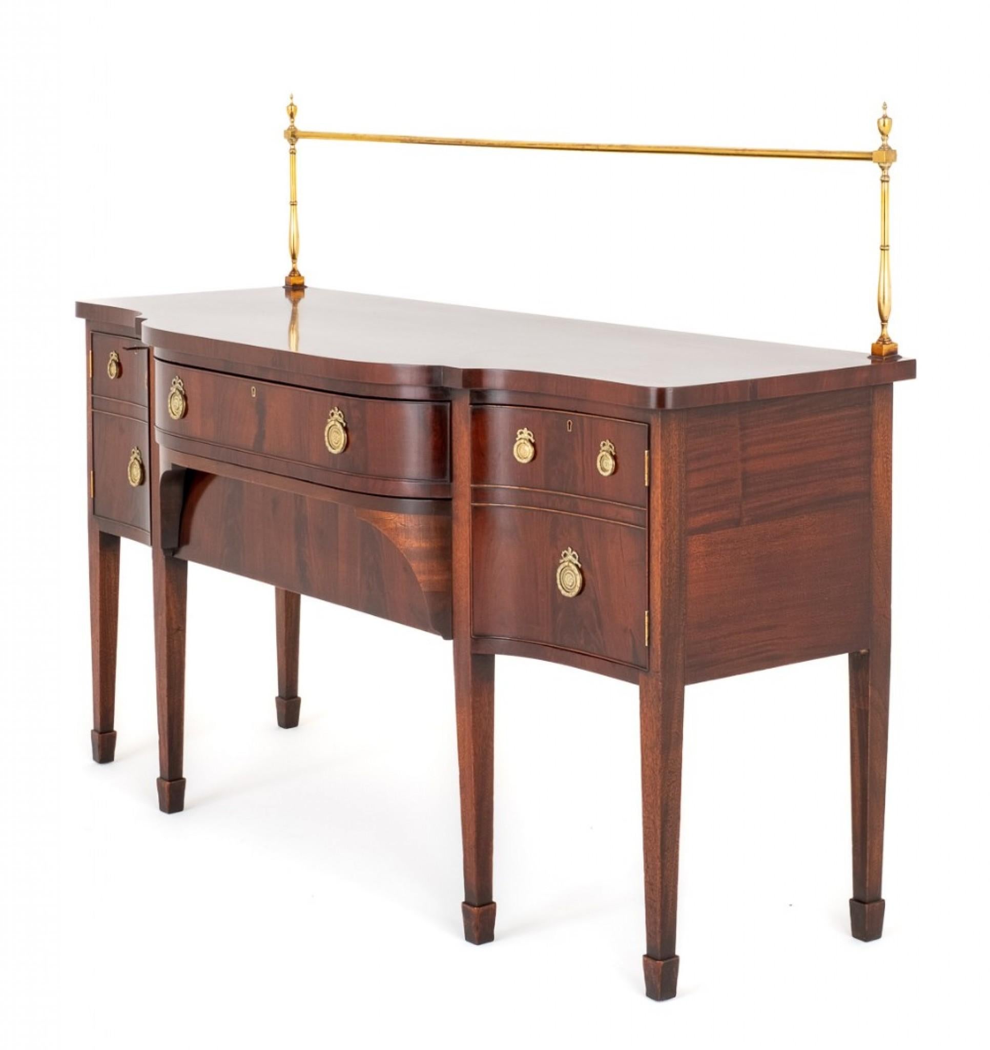 Regency Mahogany Sideboard.
This Sideboard Being of a Classical Regency Form.
Standing Upon Tapered Legs With Spade Feet.
The Sideboard is of a Shaped Form and Features 2 Mahogany Lined Drawers Flanked by Cupboards.
Circa 19th Century
The Sideboard