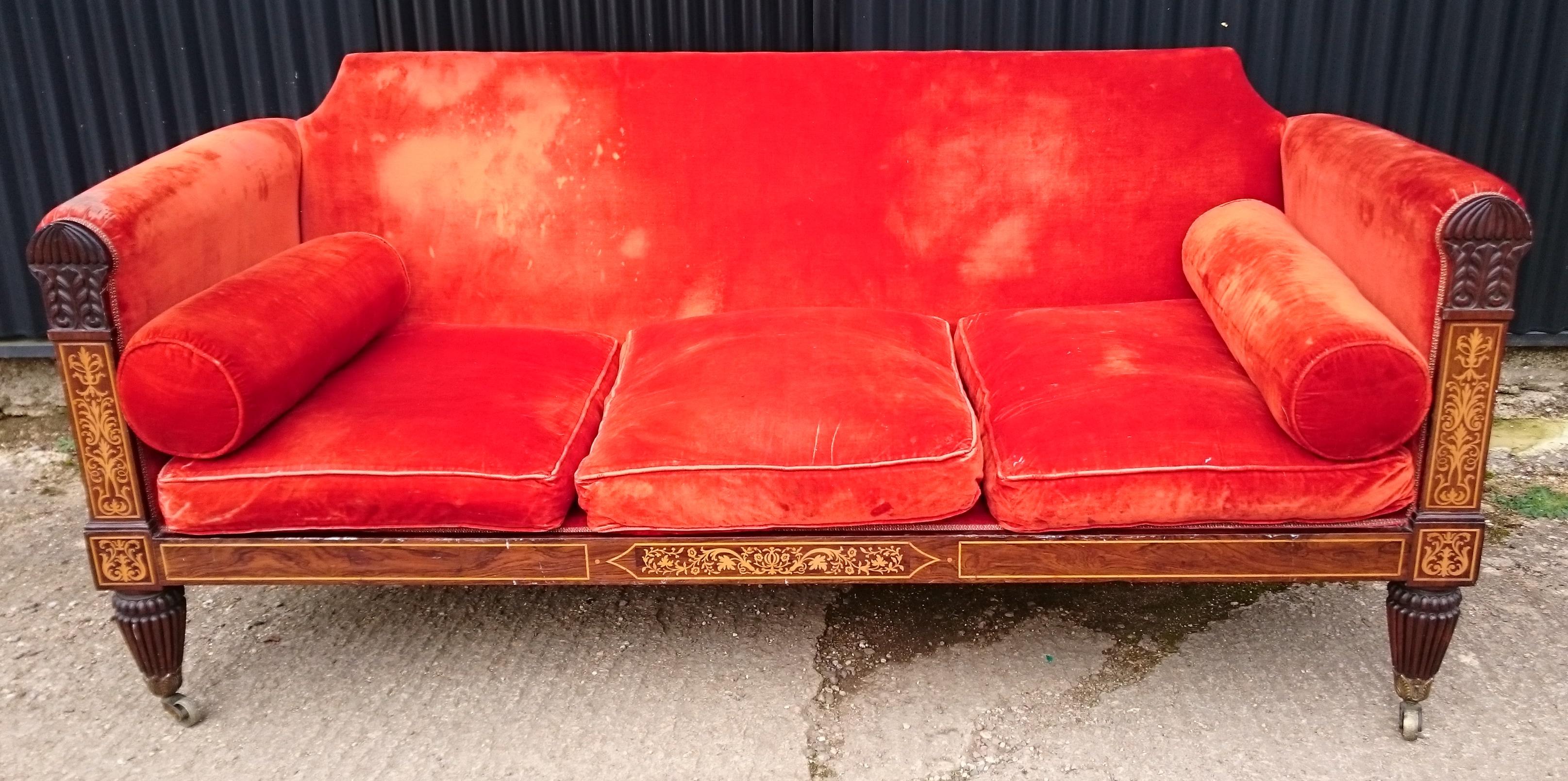 Early 19th century Regency period antique sofa. This sofa is a really fine example of classical Regency big house drawing room furniture. It has everything you could get at the period, reeded legs, acanthus carving, contra foliate scrolling,