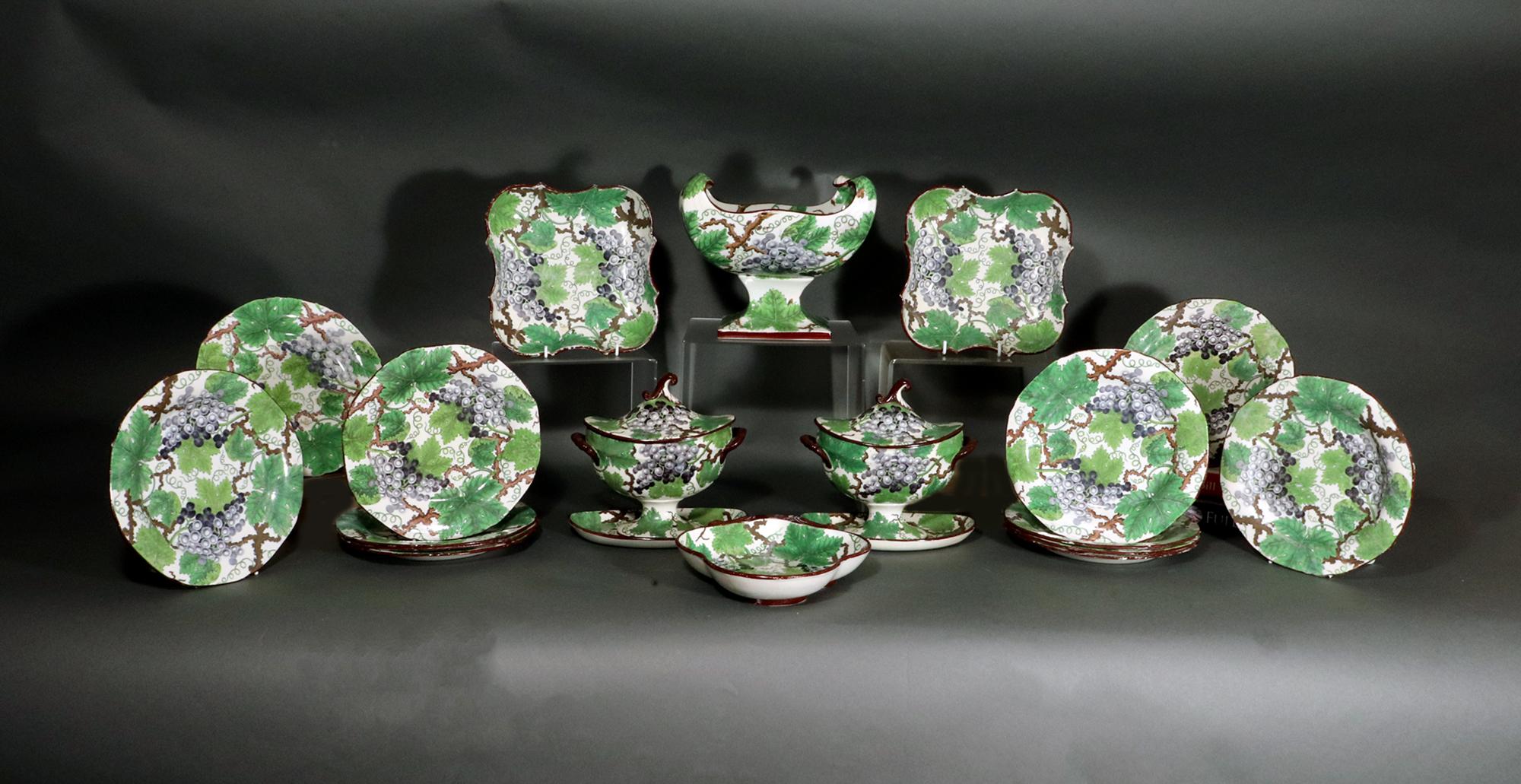 Pearlware Dessert Service with Grapes & Vines,
Probably Davenport,
Circa 1810-20

The seventeen piece Spode pearlware dessert service is printed in a light blue and the leaves are painted in shades of green and brown with fruiting grapevine.  Each
