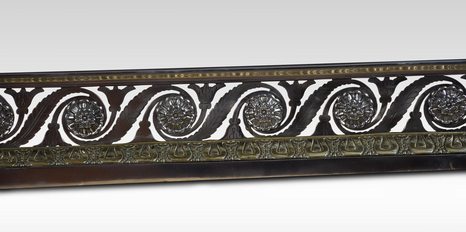 Early 19th century Regency steel and brass fender, in the manner of George Bullock. The pierced scrolling foliate frieze with rosette mounts.
Dimensions
Height 6 Inches
External measurements
Length 53.5 Inches
Depth 11 Inches
Internal