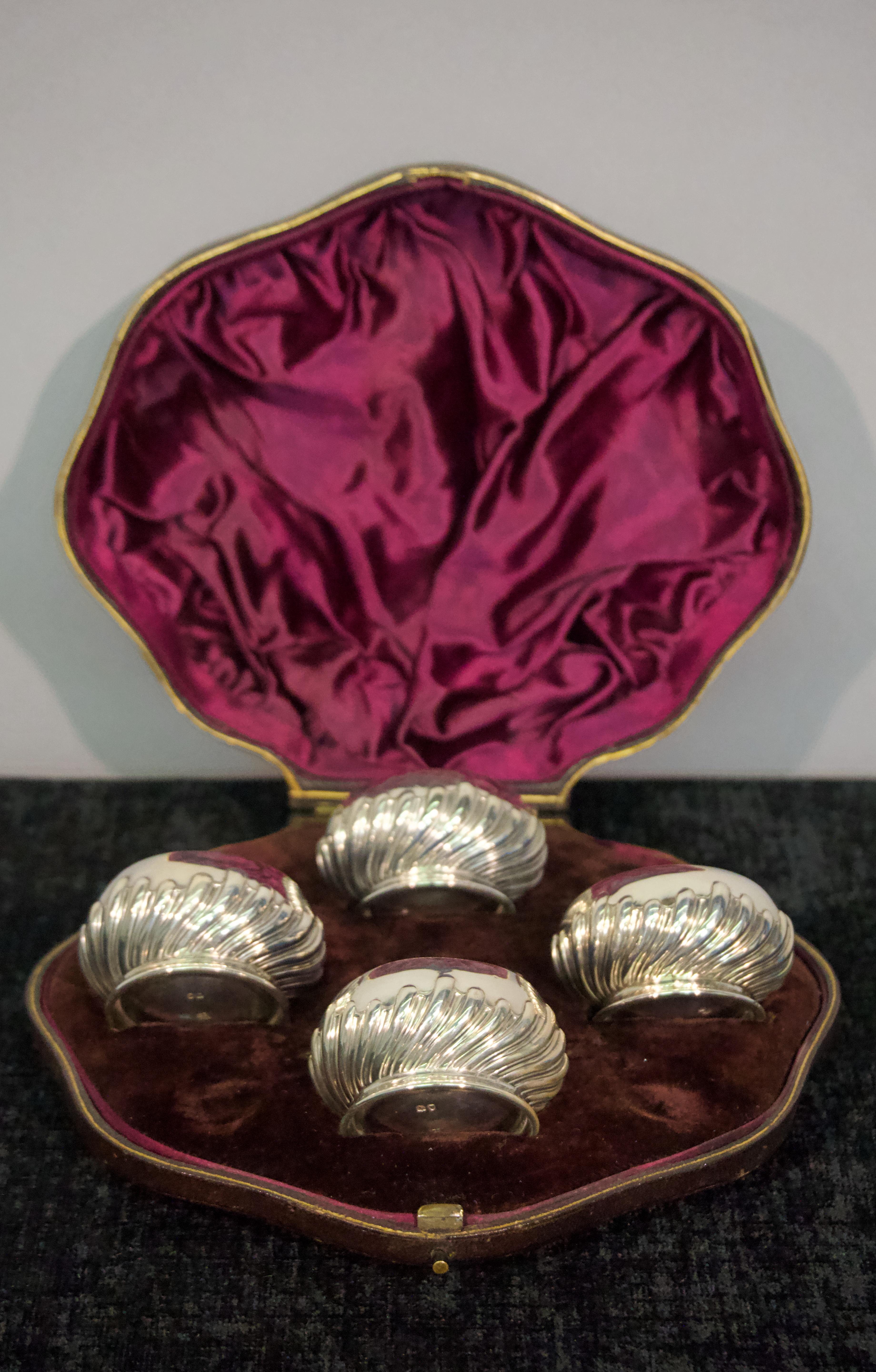 With cobalt blue glass bowl inserts and leather presentation case.
Dimensions:
Box width 7 ½, depth 7”, height 2 3/4”
Containers diameter 2”, height 1 1/2”.