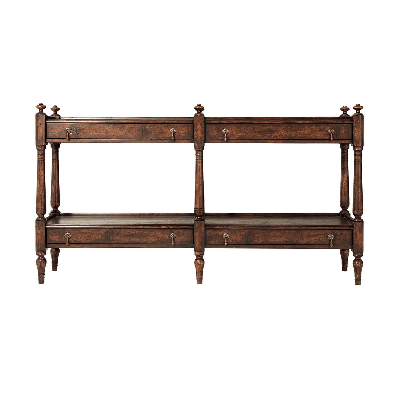 An English Regency style mahogany and reclaimed oak veneered console table restored with pollard oak, the rectangular three quarter gallery top with six turned finials atop each turned leg, with two frieze drawers and a similar under tier below, on
