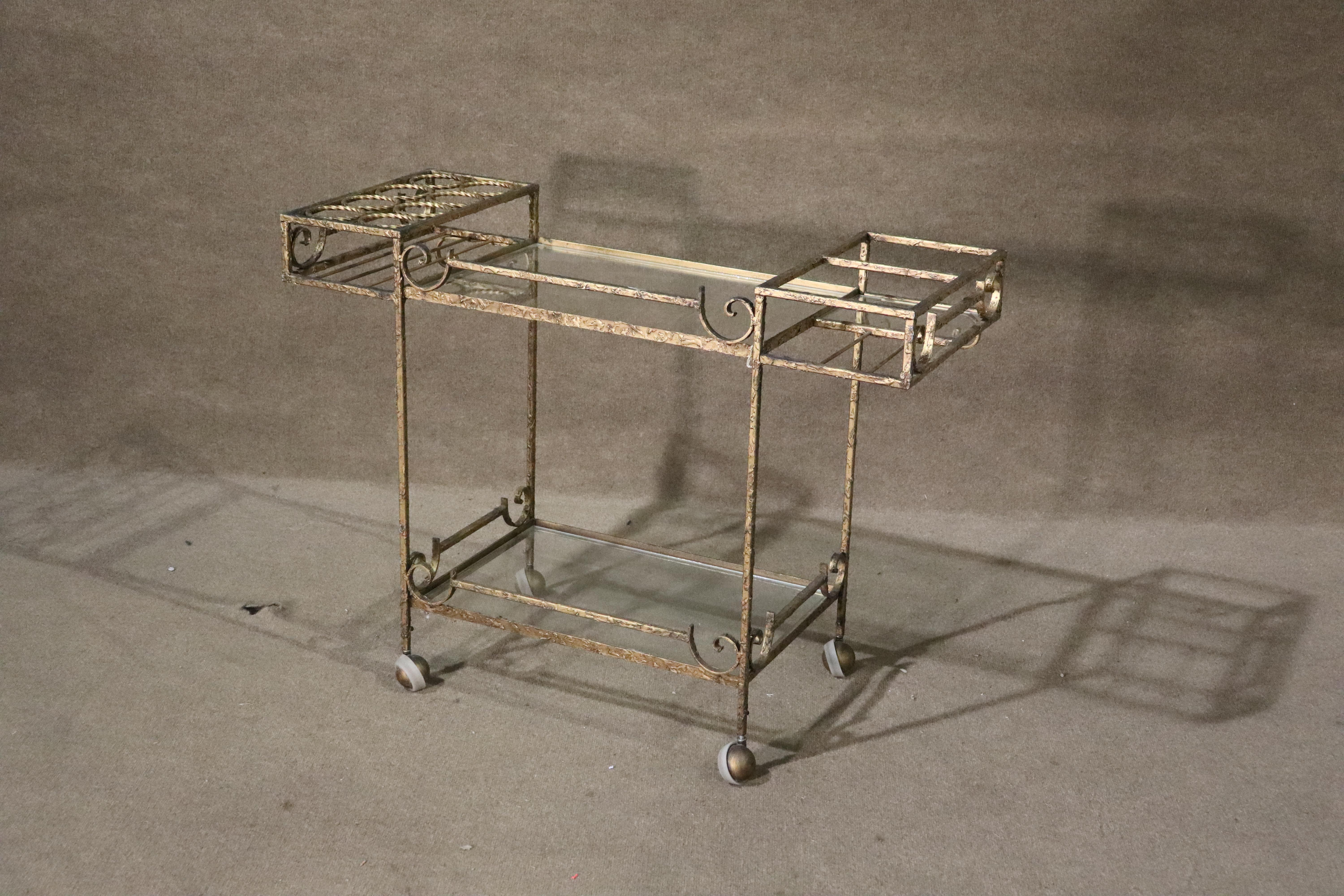Painted two tier bar cart with glass shelves and storage area.
Please confirm location NY or NJ