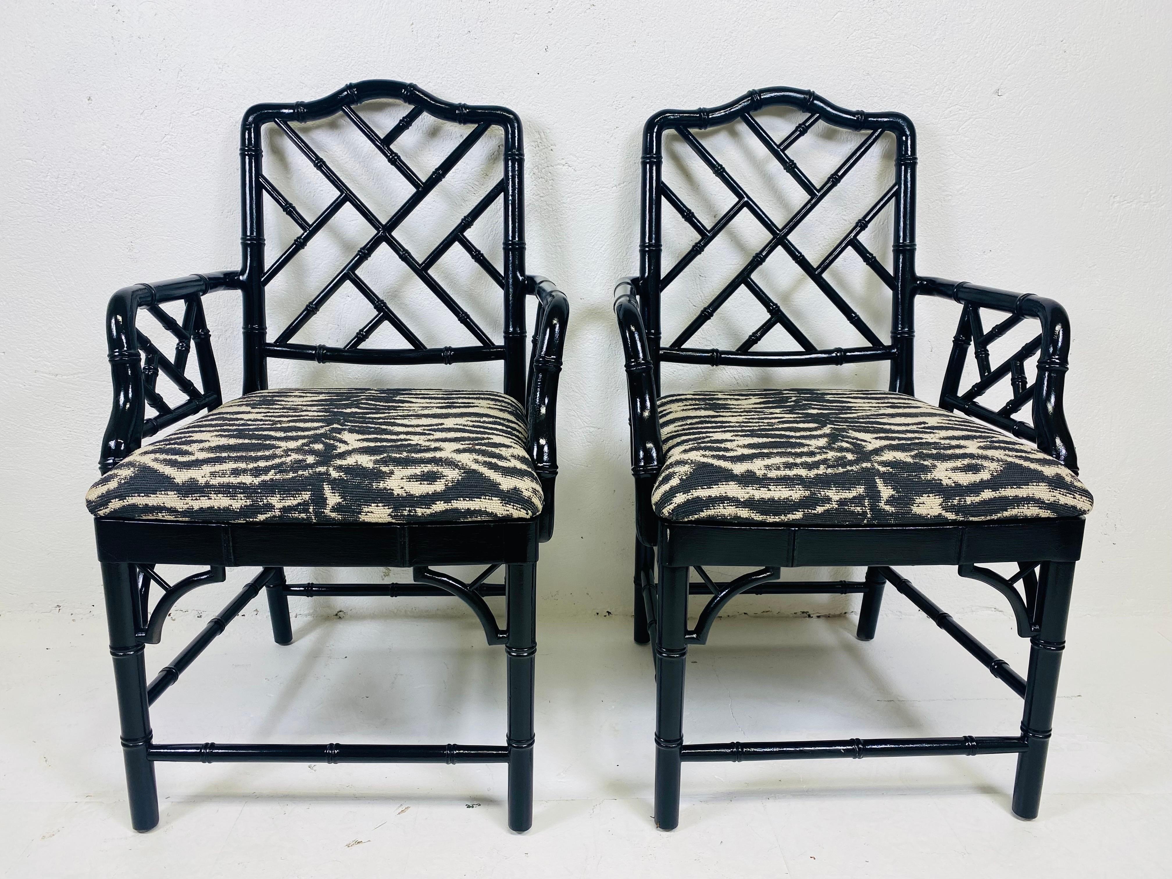American Regency style black Lacquered faux bamboo arm chairs/pair For Sale