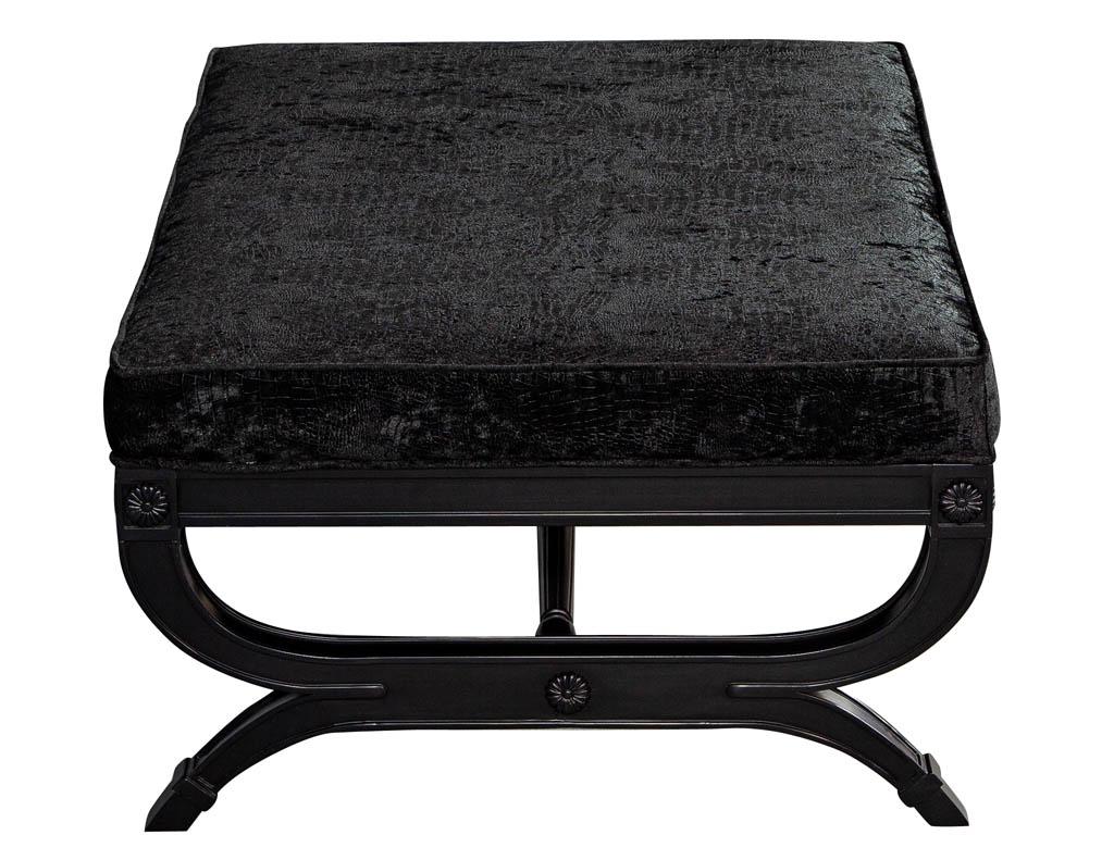 Regency style black ottoman bench. This new piece features luxurious black velvet upholstery and satin black finish. Subtle carved Regency designs complete the look.
Price includes complimentary curb side delivery to the continental USA.