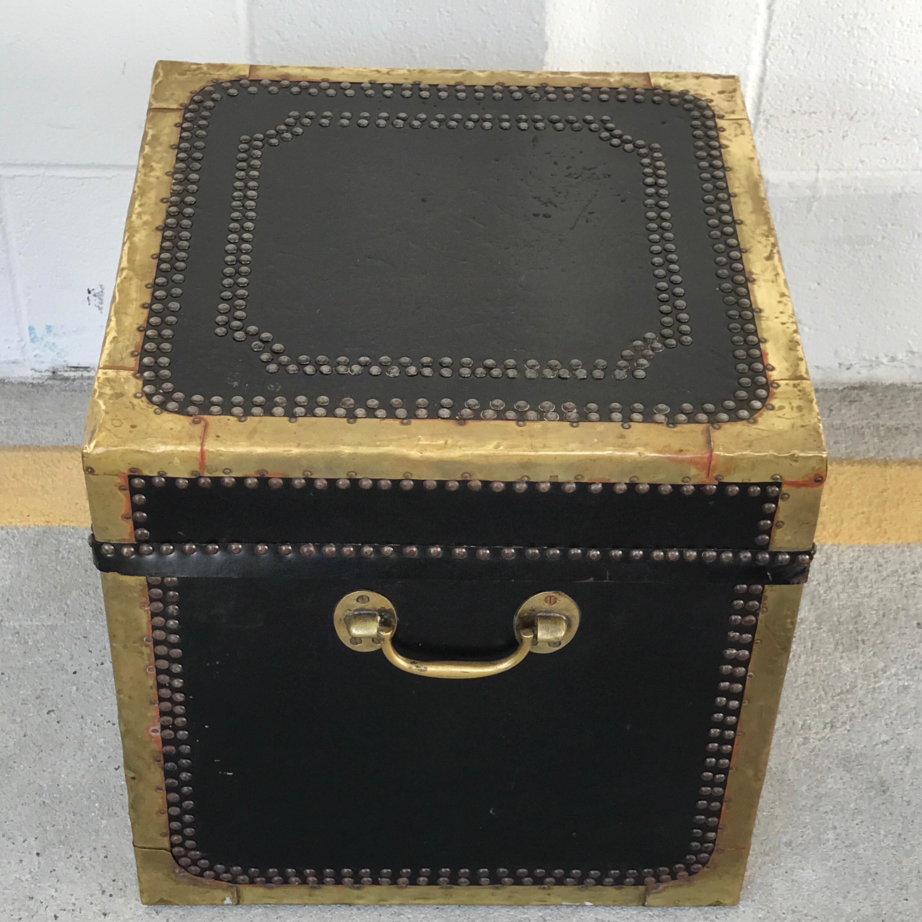 Regency style brass-mounted leather cube trunk, wonderfully distressed surface with brass and steel detail, with two brass bail handles, lock present, no key, fitted with a wood interior. Structurally sound
Interior measures 14