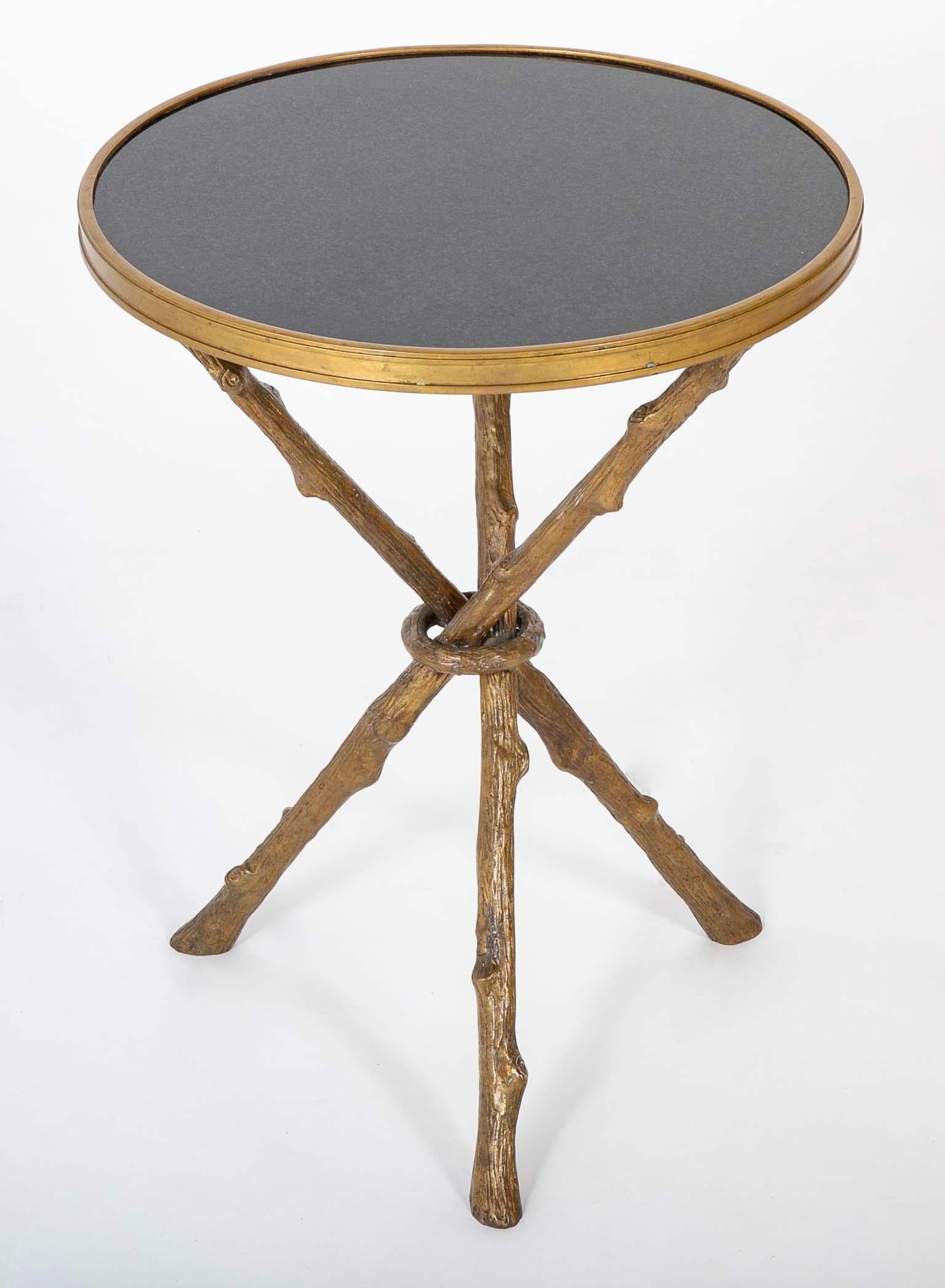 Bronzo Regency Style Bronze Round Tripod Side Table With Polished Black Granite Top in vendita