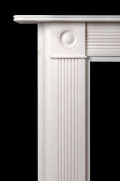 Revestimiento de chimenea de mármol estatuario estilo Regencia Bullseye