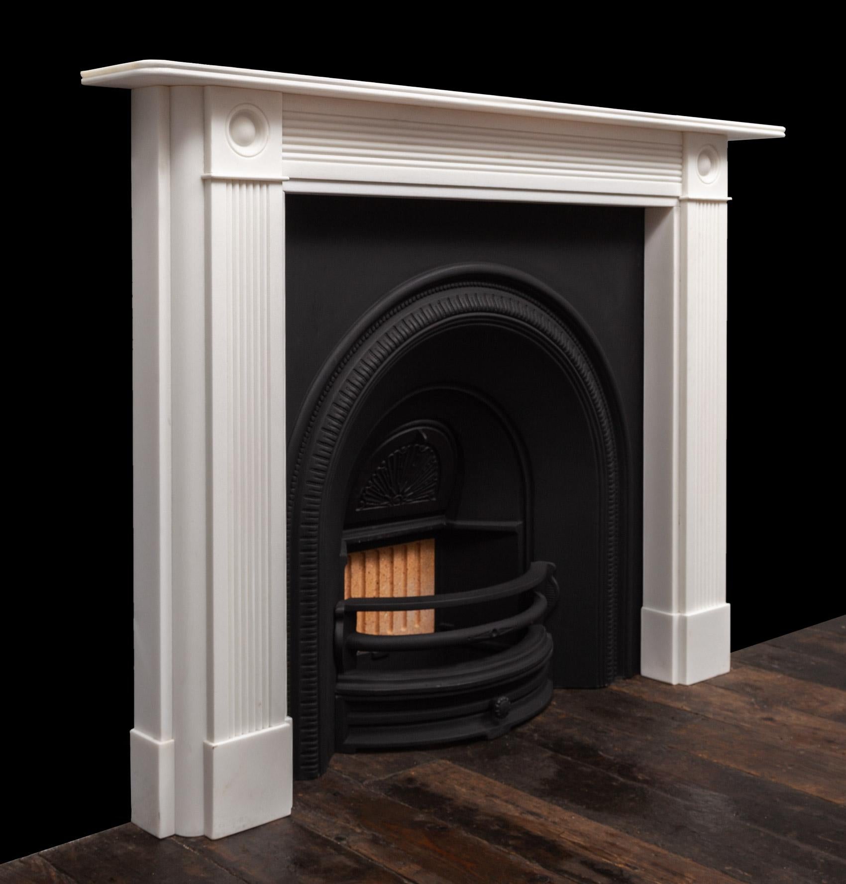 Northern Irish Regency Style Bullseye Statuary Marble Fireplace Surround For Sale