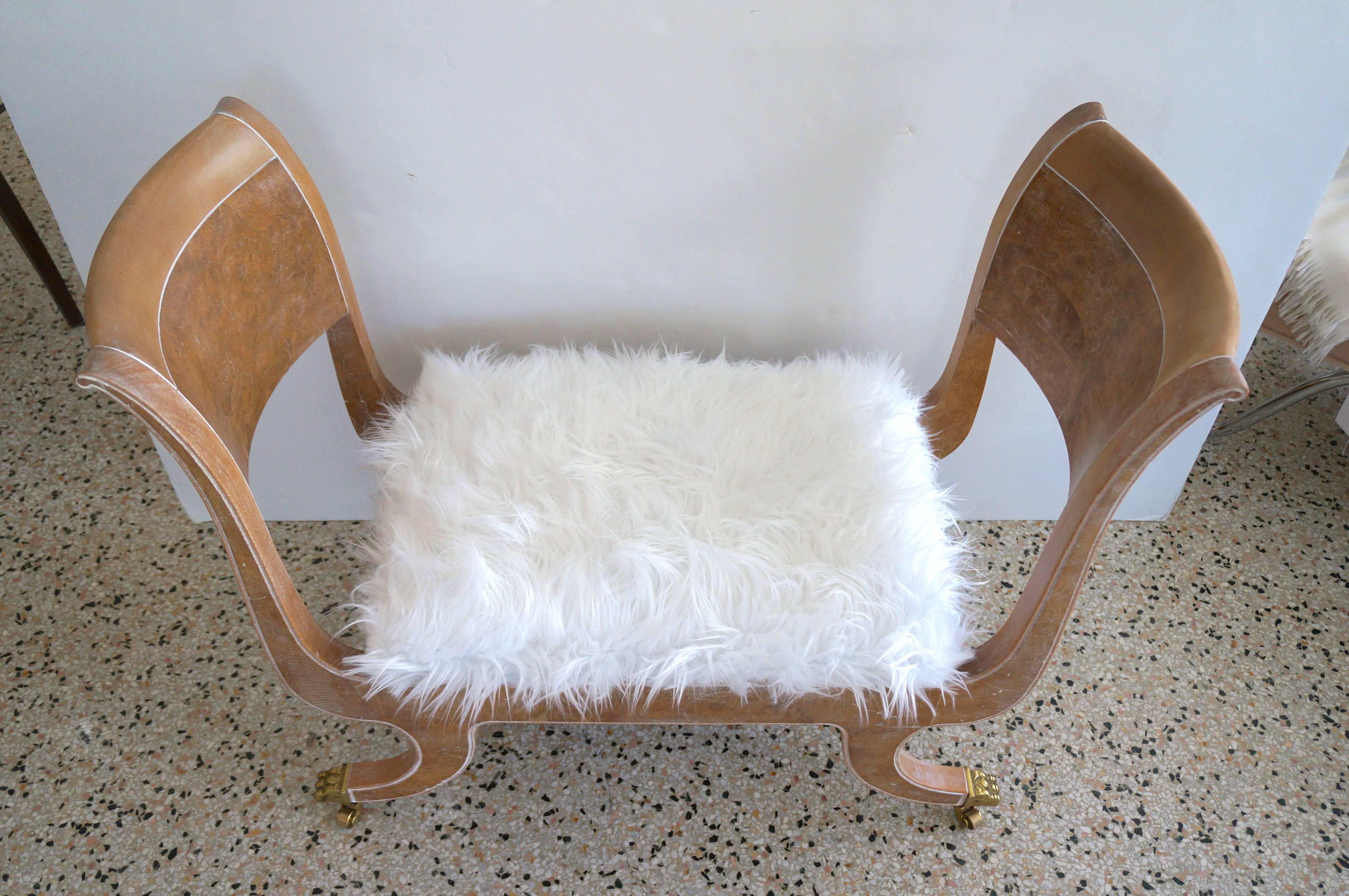 This stylish piece was created by Chapman Furniture in the 1980s and has recently been reupholstered in a white faux fur fabric and will make for a very chic perch for your home.

Note: Seat height is 16.50