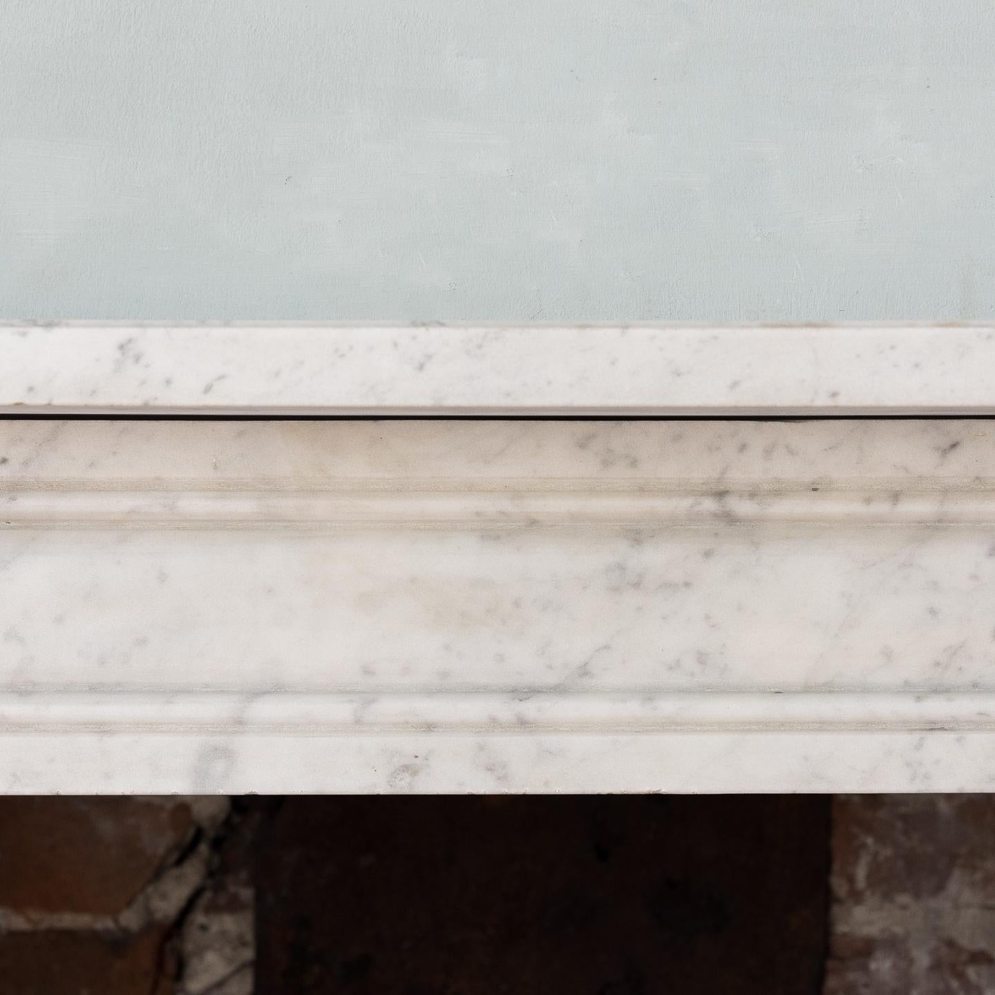 British Regency Style Carrara Marble Fireplace with Peacock's Eye Roundels
