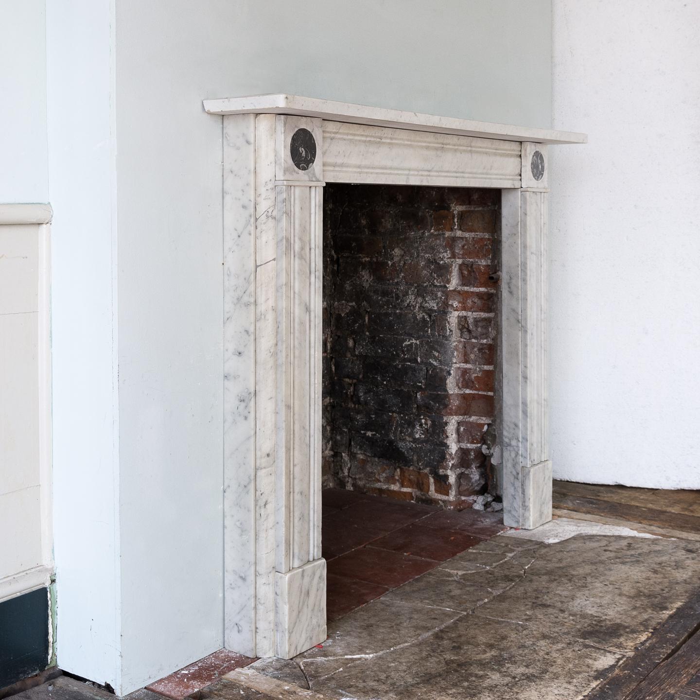 20th Century Regency Style Carrara Marble Fireplace with Peacock's Eye Roundels