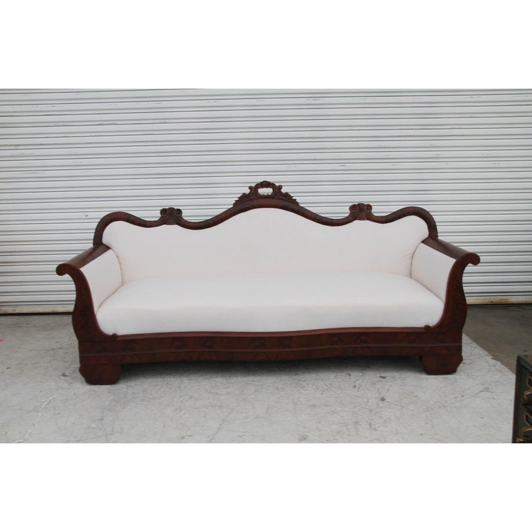 Antique Regency sofa in Mahogany

19th century antique sofa with Intricately carved details. Scrolled arms. Mahogany frame.
Reupholstery recommended.






