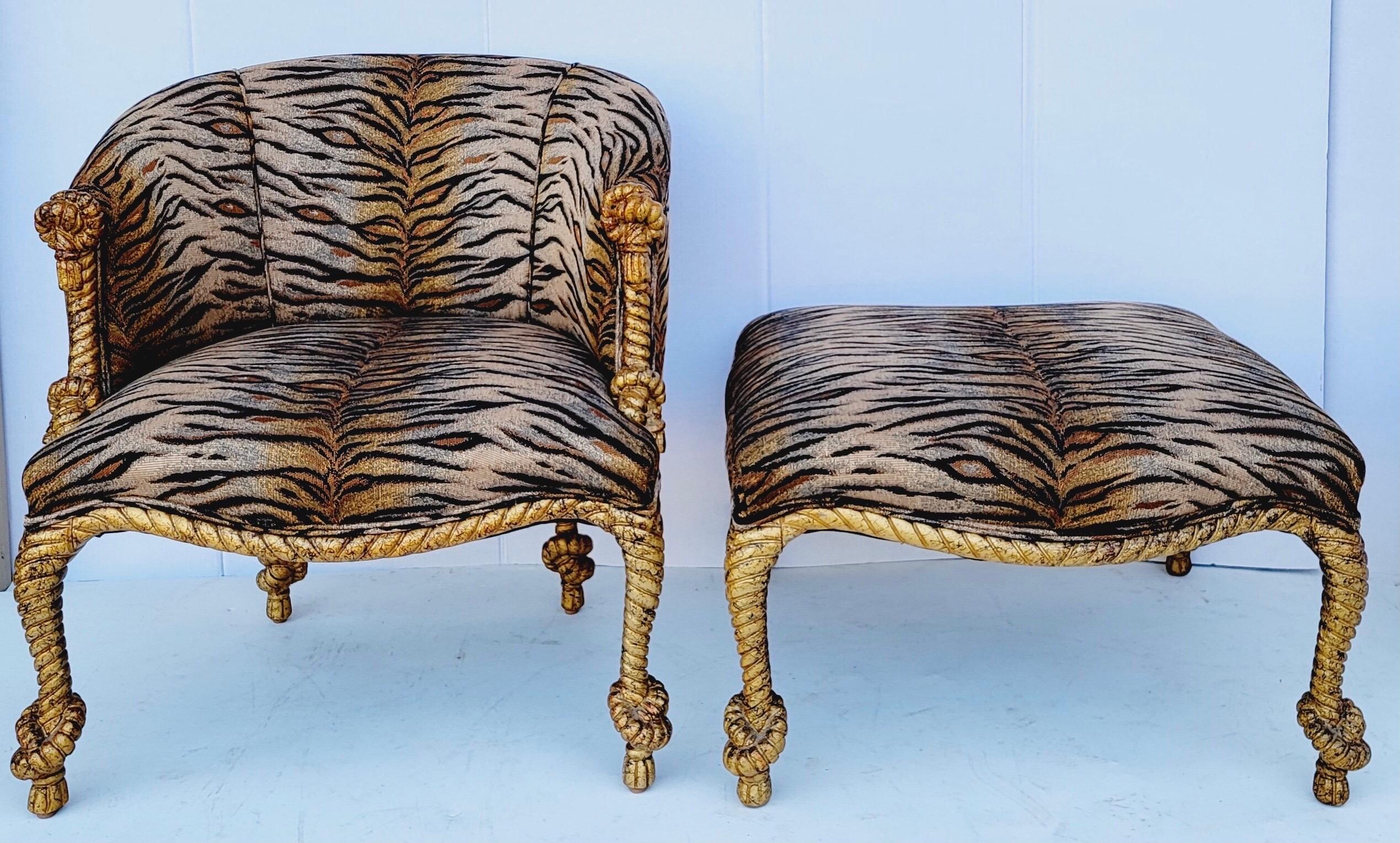 This is a regency style carved giltwood rope chair and ottoman. The upholstery is vintage and in very good condition with little wear. It is unmarked.
 
  