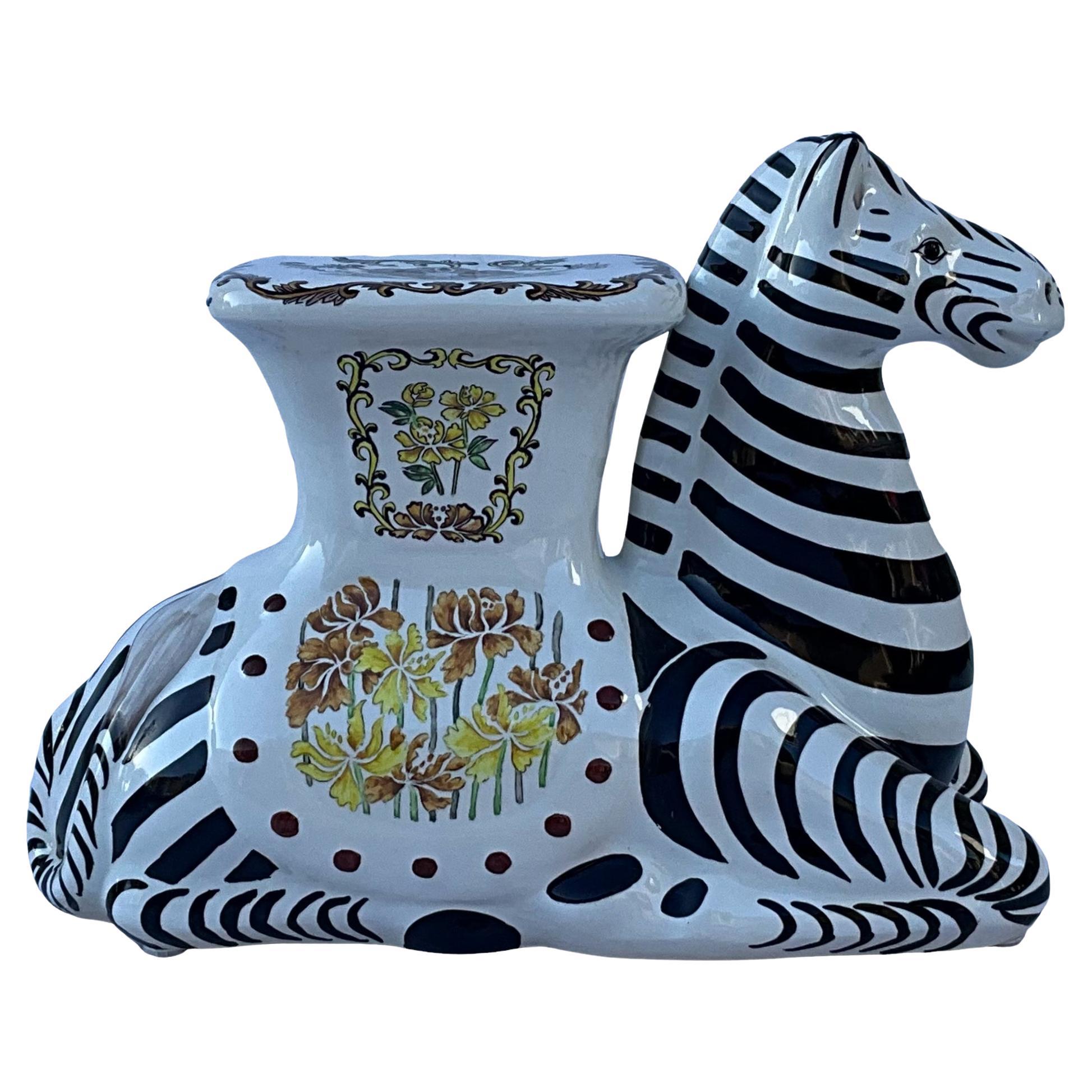 This is a Hollywood Regency style ceramic zebra form garden seat in very good condition. It is unmarked and most likely dates to the 1970s. These are typically Italian. 