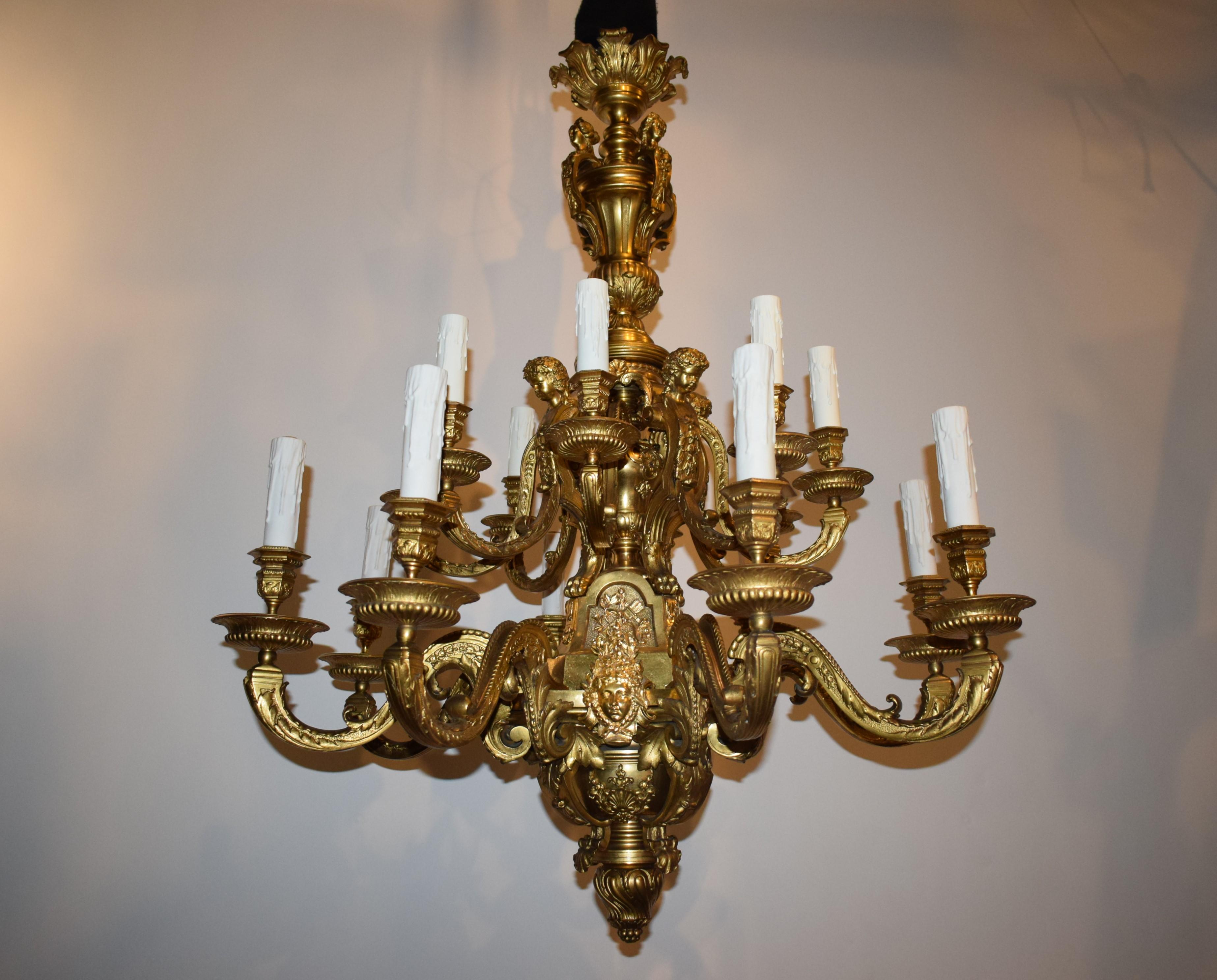 A Superb Regency style gilt bronze chandelier. Exquisite detail. Original bright and matte finish. 16 lights in two tiers. France, circa 1900.
Dimensions: Height 46