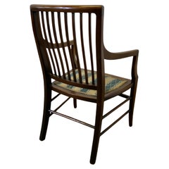 Regency Style Childs Arm Chair This is a 19th Century chair with an upholste