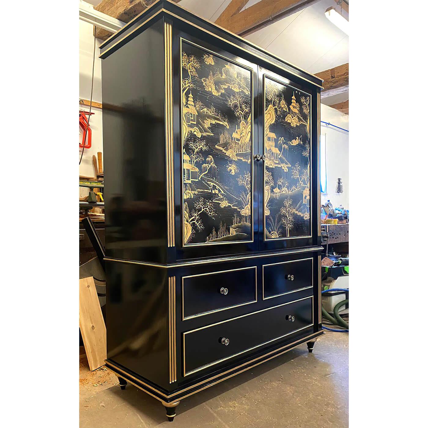 An English Regency-style cabinet. Bench made in our custom workshop in London. Fitted for TV, this can also be used as a chic antique bar cabinet.

With two hand-painted Chinoiserie lacquered and gilded panels, depicting rural Chinese scenes around