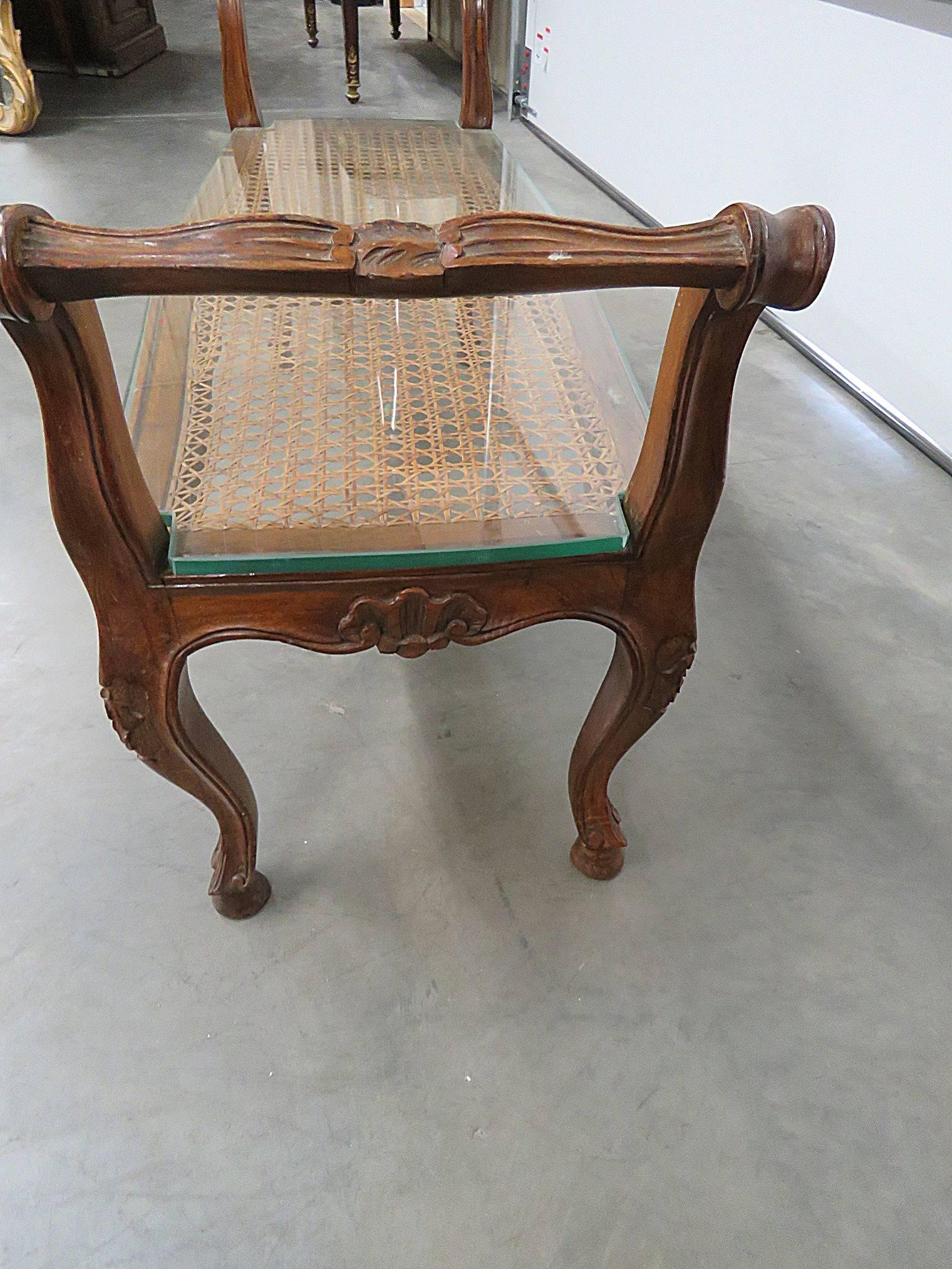 20th Century Carved Walnut Regency Style Cane Bench Shape Coffee Table
