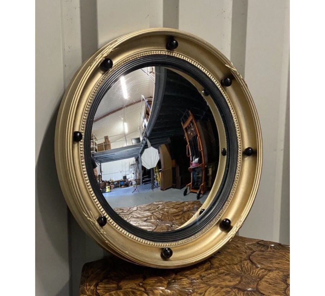 We are delighted to offer for sale this Stunning Regency Style Giltwood And Ebonised Convex Mirror. 

Dimension: Ø 48 x D 6 cm

Please carefully look at the pictures to see the condition before purchasing, as they form part of the description.