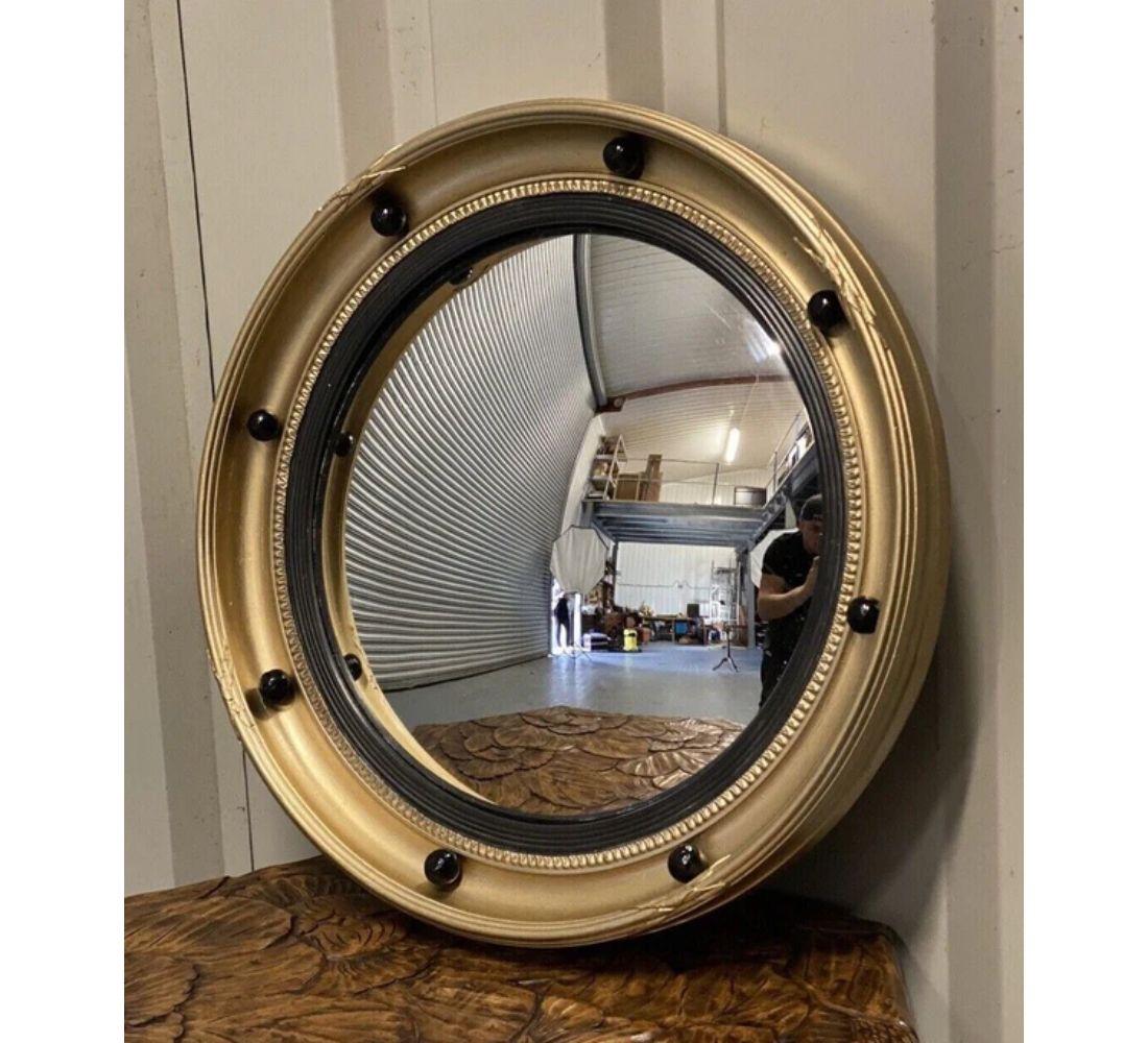 British Regency Style Convex Mirror with Giltwood And Ebonised For Sale